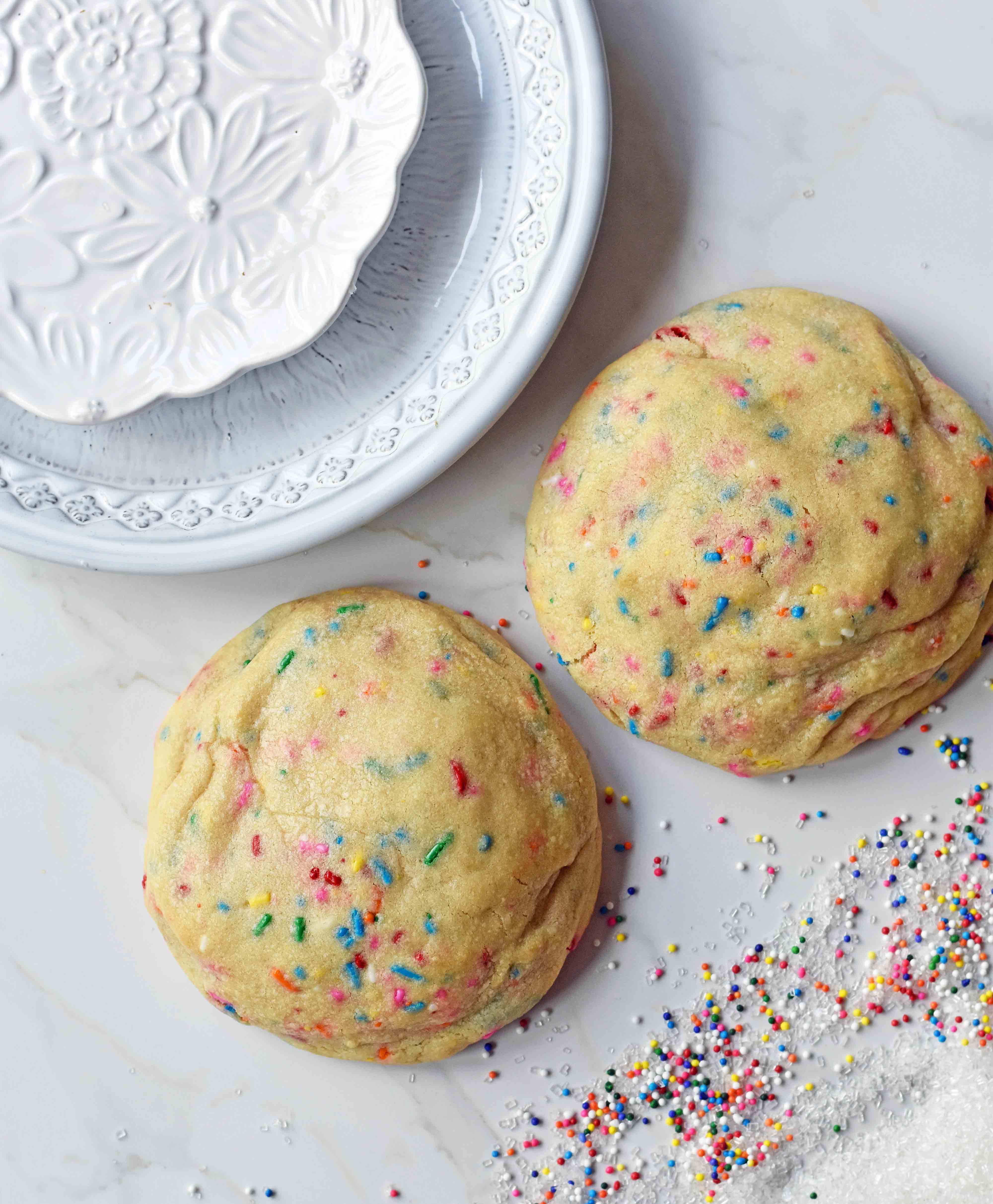 Funfetti Cookies are soft chewy vanilla sugar cookies with rainbow sprinkles. Sprinkles cookies are perfect for birthday parties, graduation, or any celebration. The perfect funfetti cookie made from scratch. www.modernhoney.com