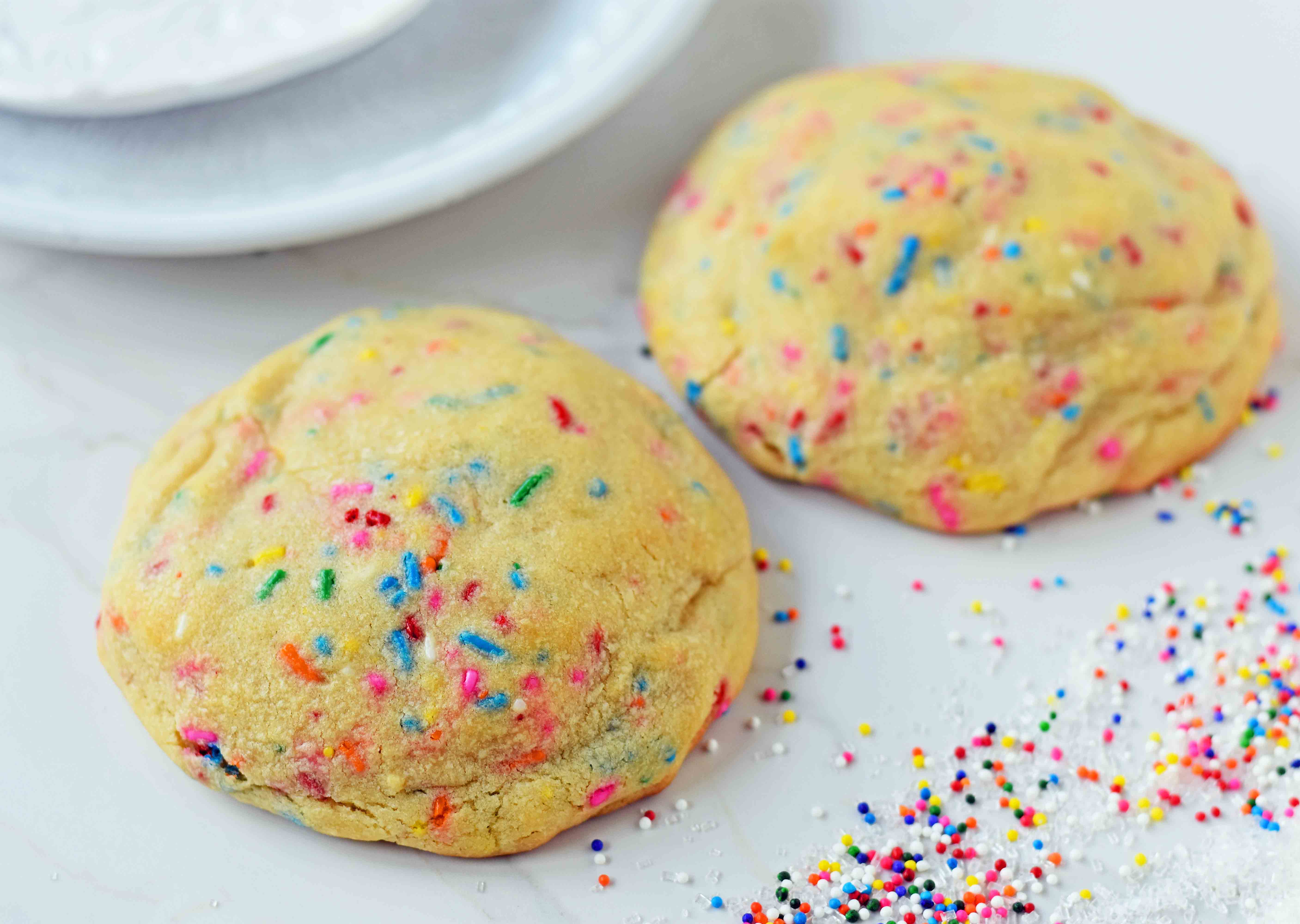 Funfetti Cookies are soft chewy vanilla sugar cookies with rainbow sprinkles. Sprinkles cookies are perfect for birthday parties, graduation, or any celebration. The perfect funfetti cookie made from scratch. www.modernhoney.com