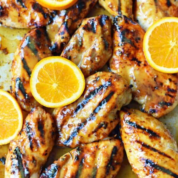 Honey Mustard Grilled Chicken. How to make sweet and tangy grilled honey mustard chicken. A honey mustard marinade and sauce in one! The perfect chicken for your summer BBQ. www.modernhoney.com #honeymustard #honeymustardchicken