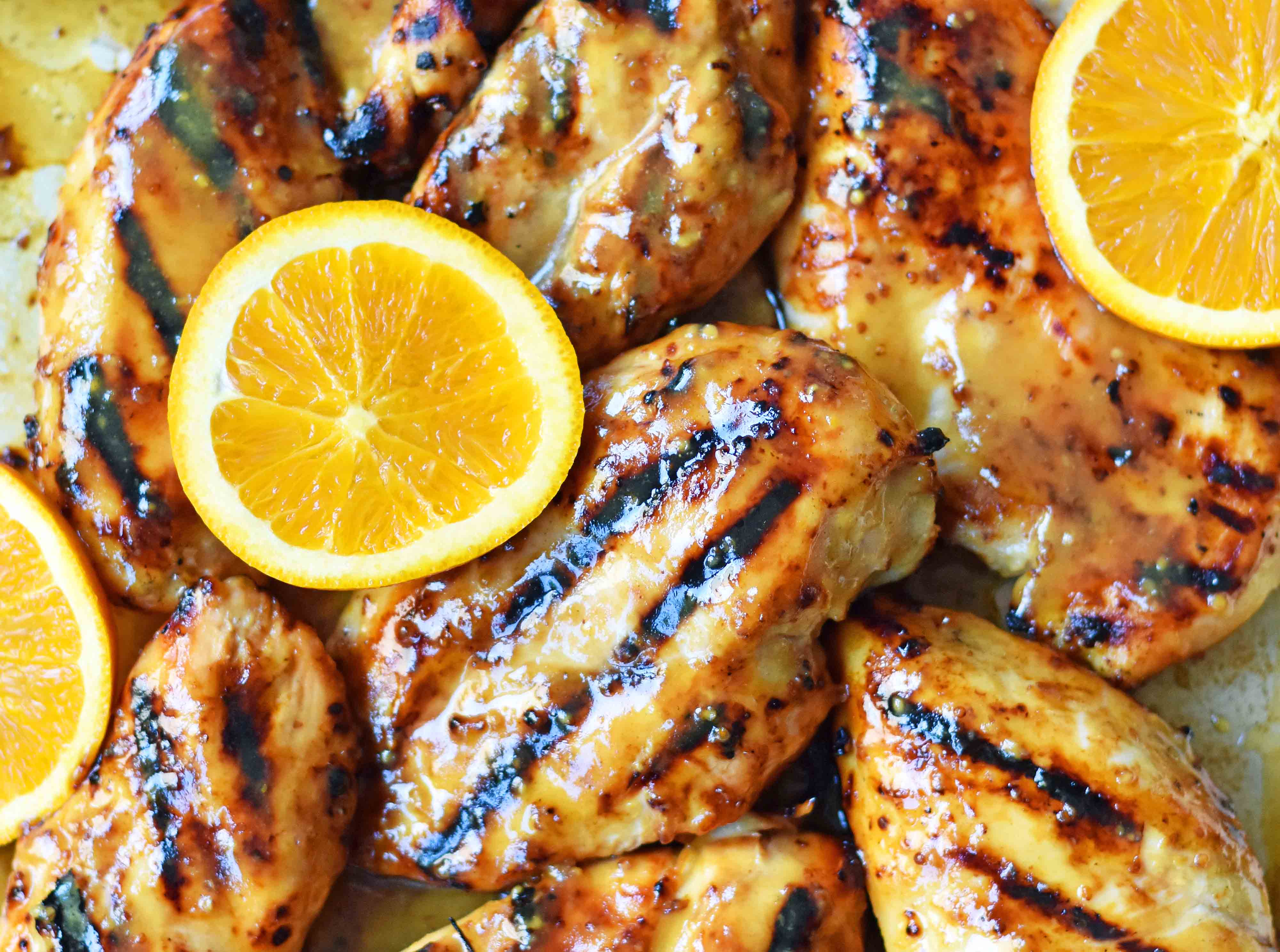 Honey Mustard Grilled Chicken. How to make sweet and tangy grilled honey mustard chicken. A honey mustard marinade and sauce in one! The perfect chicken for your summer BBQ. www.modernhoney.com #honeymustard #honeymustardchicken 