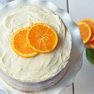 Homemade Orange Cake with Sweet Orange Cream Cheese Frosting. How to make the best orange cake. Orange cake with orange frosting. Naked orange cake.