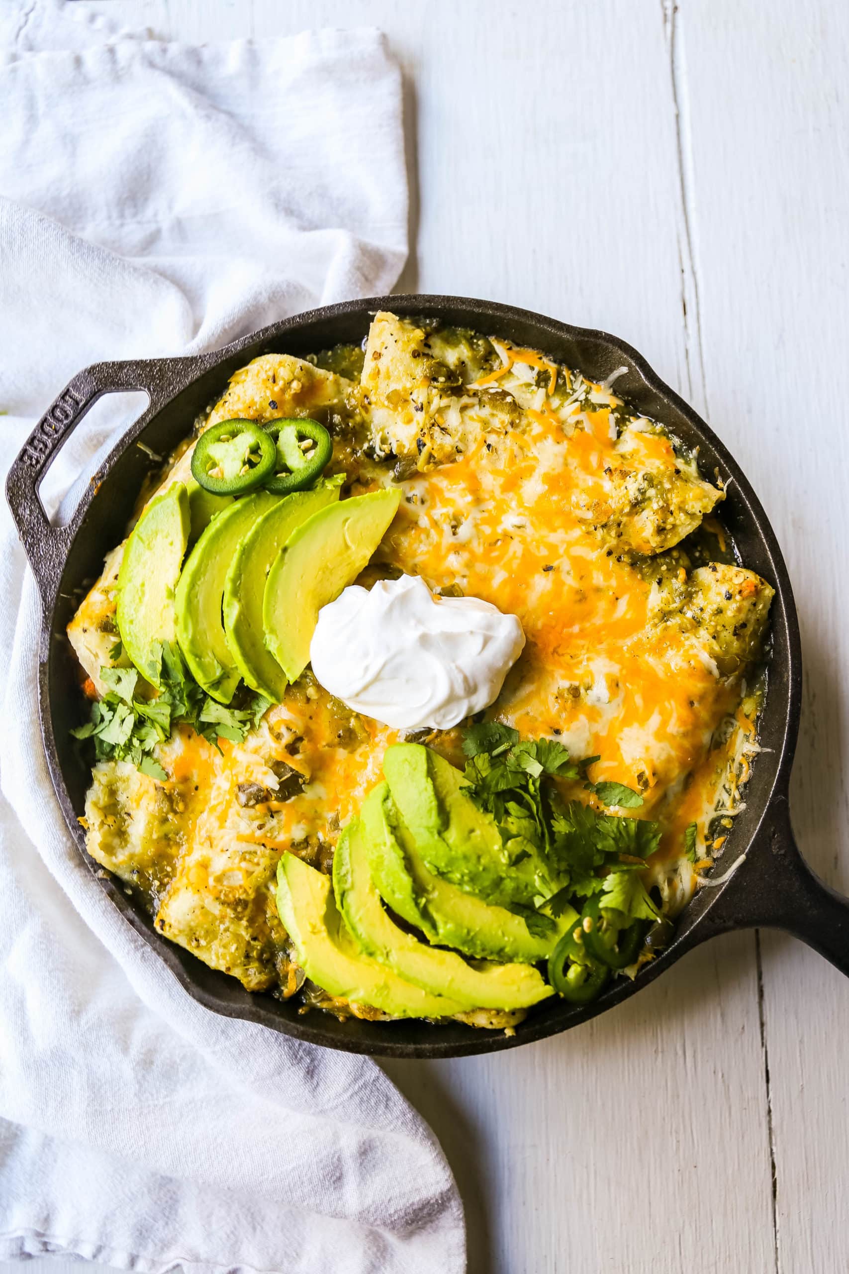 Sweet Potato Black Bean Enchiladas with Salsa Verde  Black beans, sweet potatoes, and roasted poblano chilies rolled into corn tortillas and topped with salsa verde and Mexican cheeses. www.modernhoney.com #vegetableenchiladas #enchiladas