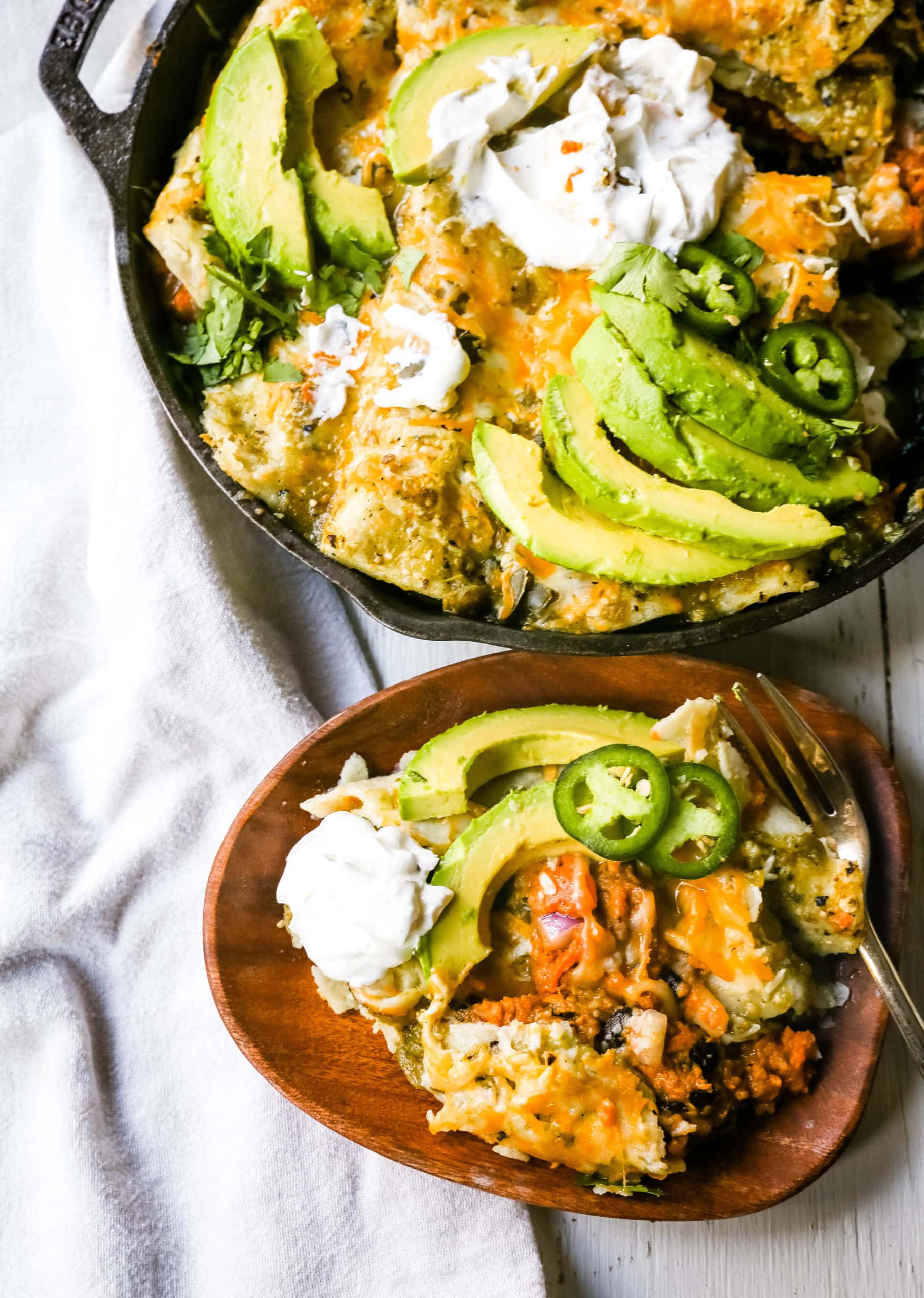 Sweet Potato Black Bean Enchiladas with Salsa Verde  Black beans, sweet potatoes, and roasted poblano chilies rolled into corn tortillas and topped with salsa verde and Mexican cheeses. www.modernhoney.com #vegetableenchiladas #enchiladas