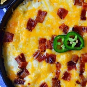 Creamy Jalapeno Popper Dip with Bacon. Homemade Jalapeno Popper Dip made with cream cheese, sour cream, mayo, fresh jalapenos, two kinds of Mexican cheeses, and crispy bacon. The perfect party appetizer. This Jalapeno Popper Dip is so popular! www.modernhoney.com