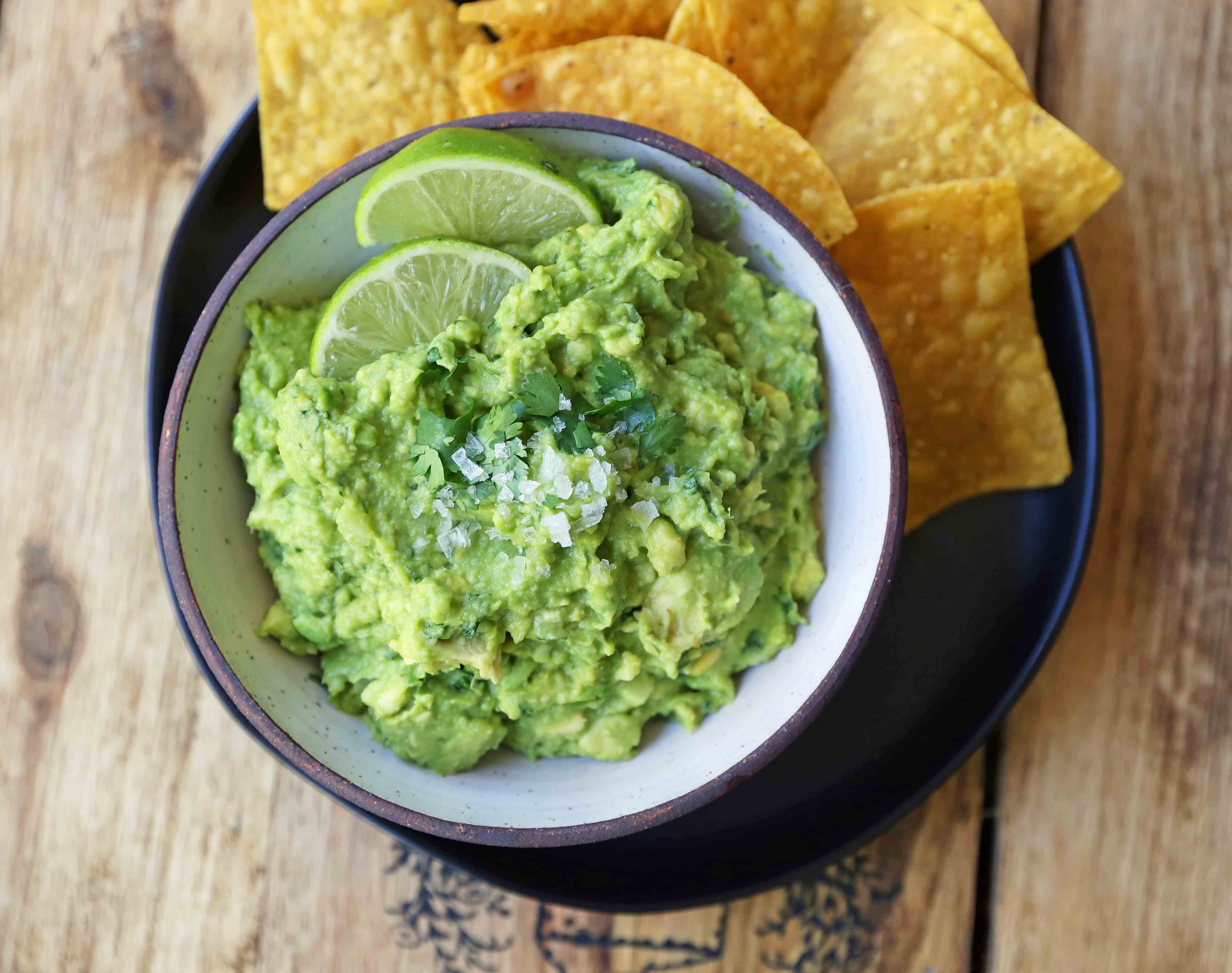 The Best Guacamole Recipe. How to make authentic Mexican guacamole. Simple perfect guacamole made with the freshest ingredients. www.modernhoney.com #guacamole #bestguacamole #avocados