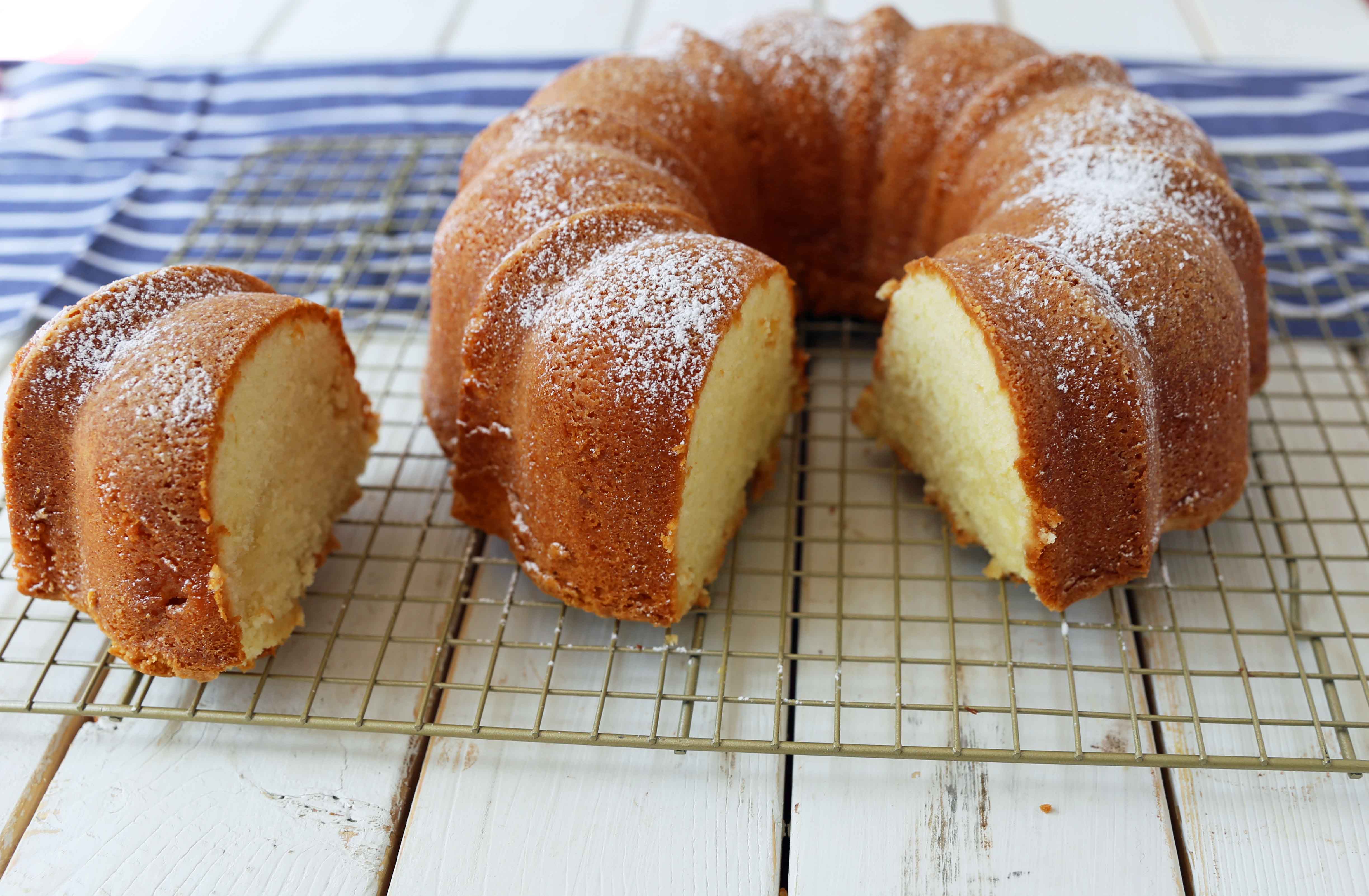 The BEST Cream Cheese Pound Cake. How to make the perfect pound cake in a bundt pan. Buttery cream cheese pound cake goes with everything! This is such a popular cake that is wonderful on its own or in a trifle or berry compote. www.modernhoney.com #poundcake #bundtcake #cake #creamcheesecake