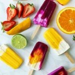 Homemade Fruit Popsicles Recipe. Fruit and Cream Popsicles. How to make homemade fruit and cream popsicles. Mango and Cream Popsicles. Pitaya and Cream Popsicles. Peaches and Cream Popsicles. Pitaya Strawberry Popsicles. www.modernhoney.com #popsicles #fruitpopsicles #fruitandcreampopsicles #homemadepopsicles