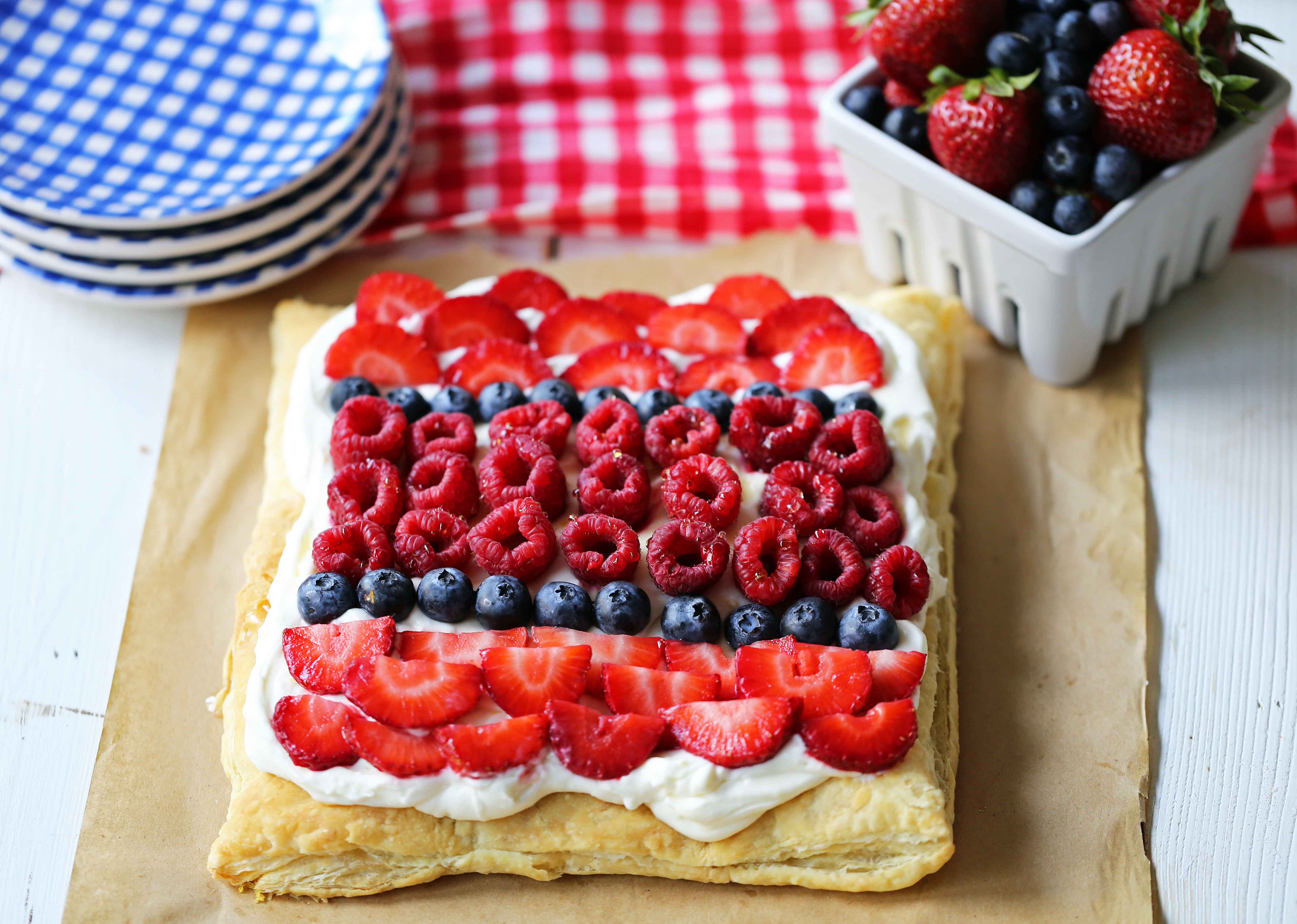 Lemon Berry Cheesecake Puff Pastry Baked Puff Pastry topped with Lemon Cheesecake Filling and Fresh Berries. An easy, beautiful, festive summer dessert. www.modernhoney.com 