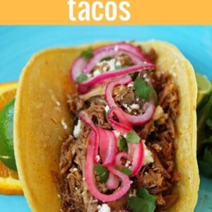 Mexican Pork Carnitas Tacos. Slow Cooker Pork Carnitas with Pickled Onions. How to make tender and flavorful pork carnitas slow cooked in Coca-Cola and citrus juices. www.modernhoney.com #tacos #carnitas #porkcarnitas #slowcooker #slowcookercarnitas