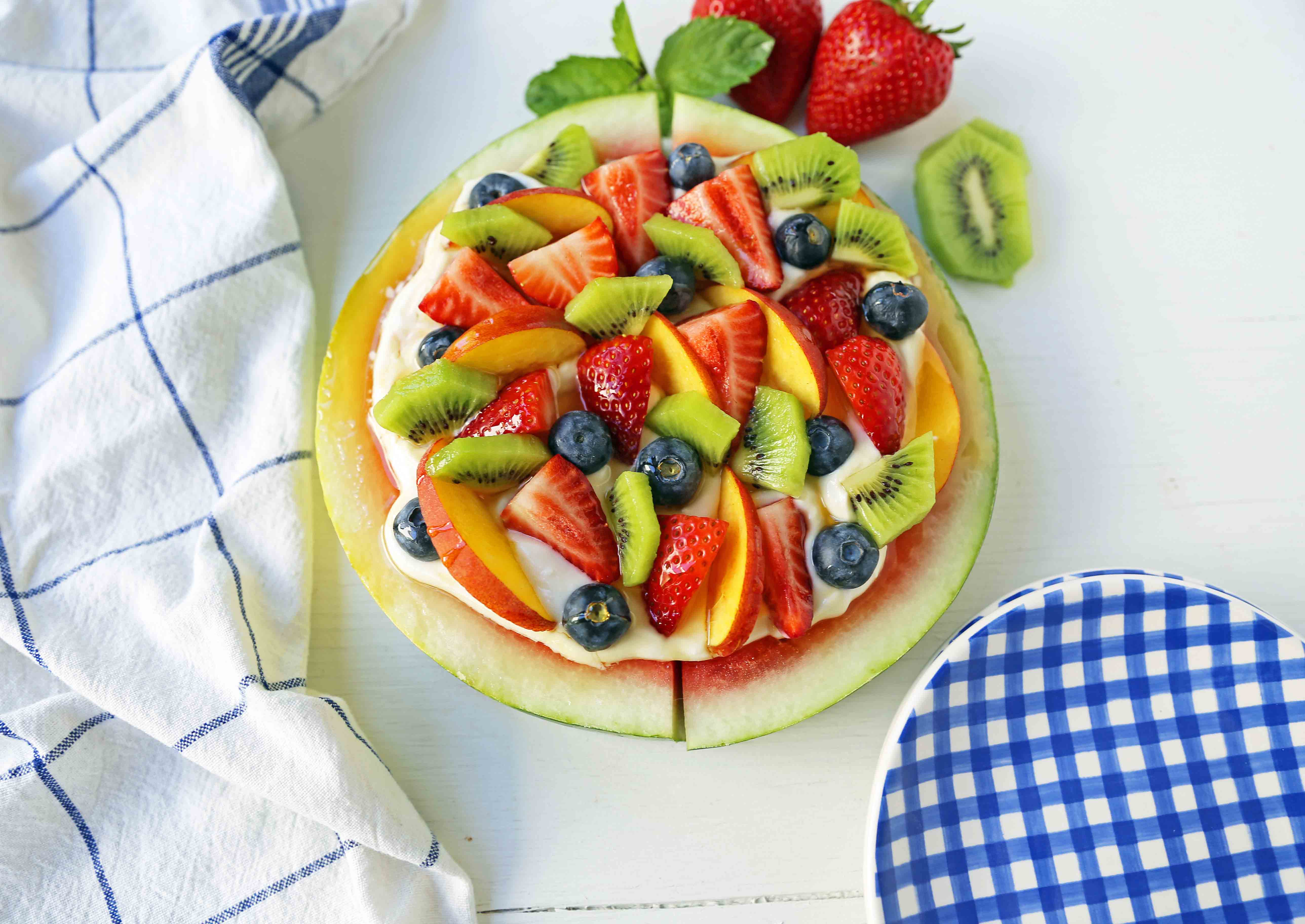 Watermelon Fruit Pizza Cake. A healthy, no-guilt summer dessert recipe. Fresh fruit dessert. The ultimate watermelon and fresh fruit dessert. www.modernhoney.com #fruit #fruitdessert #freshfruit #summer #summerdessert