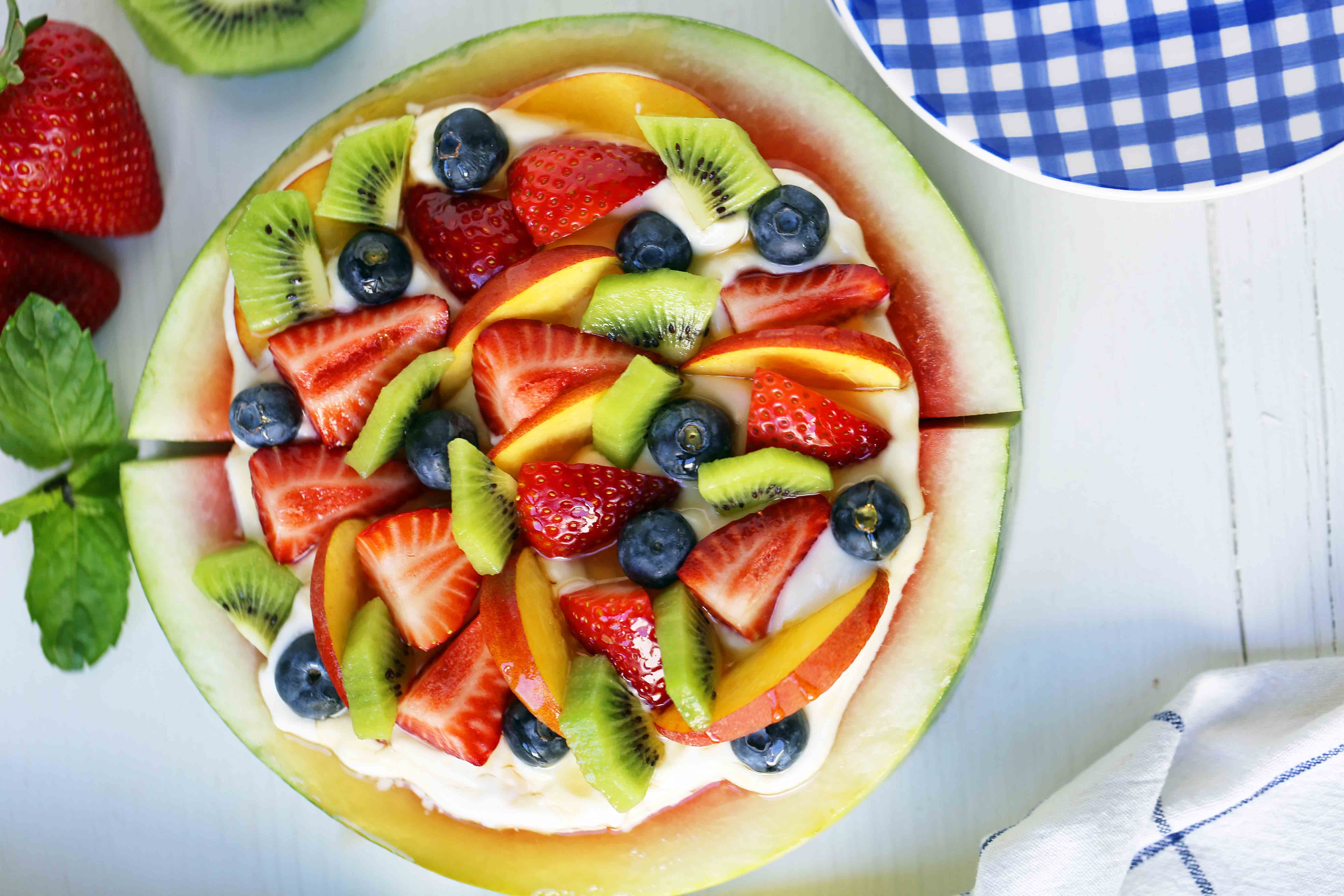 Watermelon Fruit Pizza Cake. A healthy, no-guilt summer dessert recipe. Fresh fruit dessert. The ultimate watermelon and fresh fruit dessert. www.modernhoney.com #fruit #fruitdessert #freshfruit #summer #summerdessert