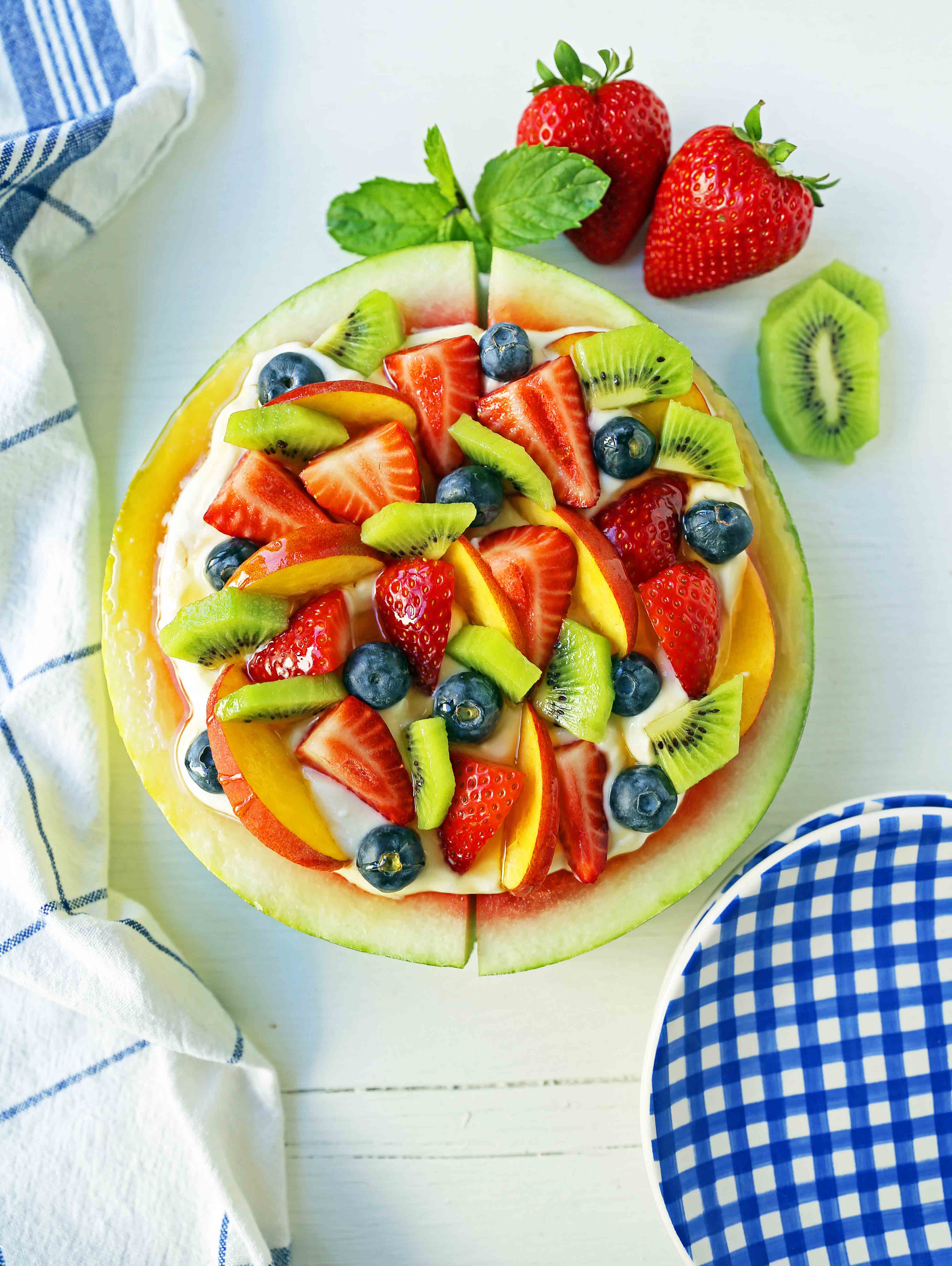 Watermelon Fruit Pizza Cake. A healthy, no-guilt summer dessert recipe. Fresh fruit dessert. The ultimate watermelon and fresh fruit dessert. www.modernhoney.com #fruit #fruitdessert #freshfruit #summer #summerdessert