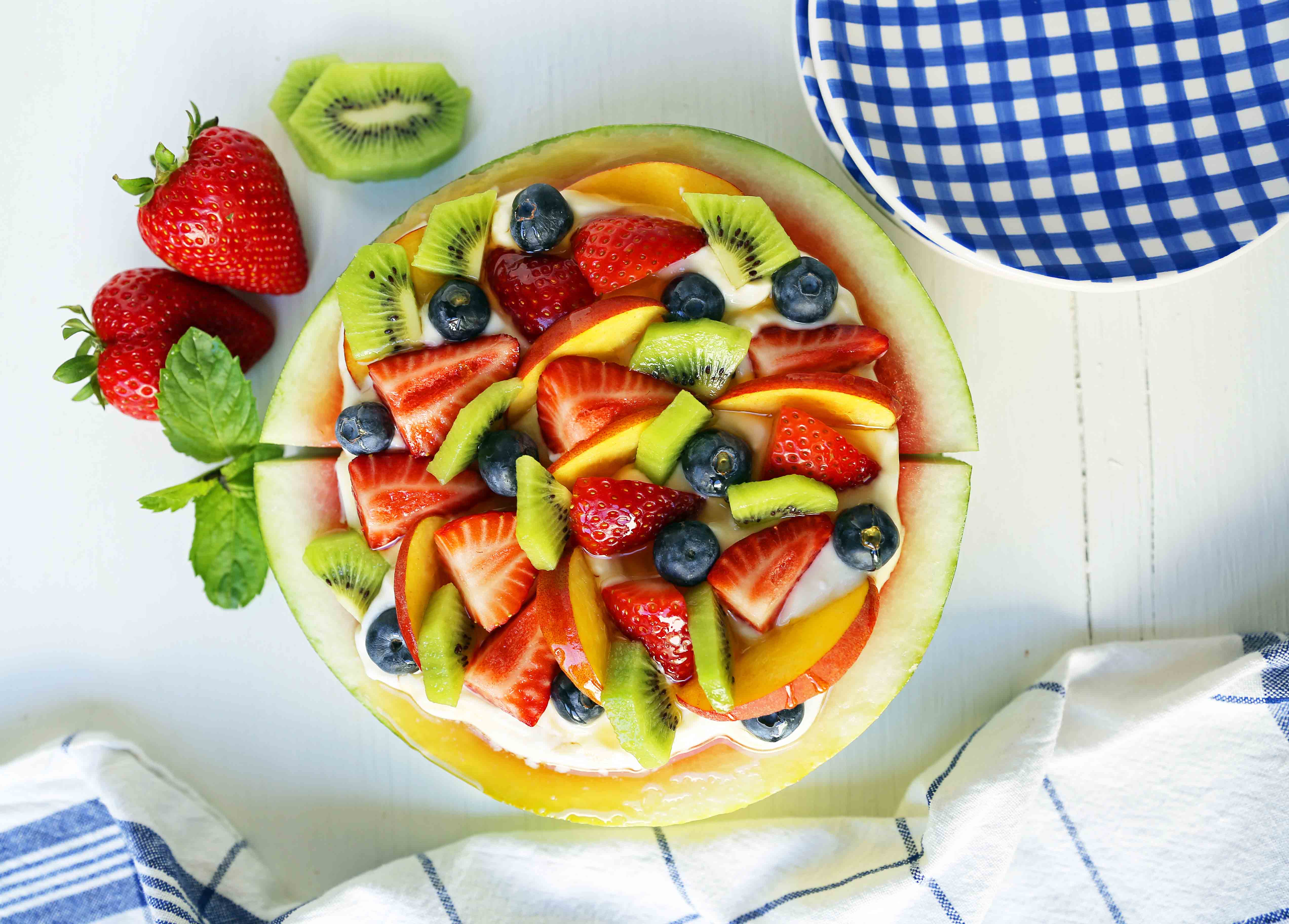 Watermelon Fruit Pizza Cake. A healthy, no-guilt summer dessert recipe. Fresh fruit dessert. The ultimate watermelon and fresh fruit dessert. www.modernhoney.com #fruit #fruitdessert #freshfruit #summer #summerdessert