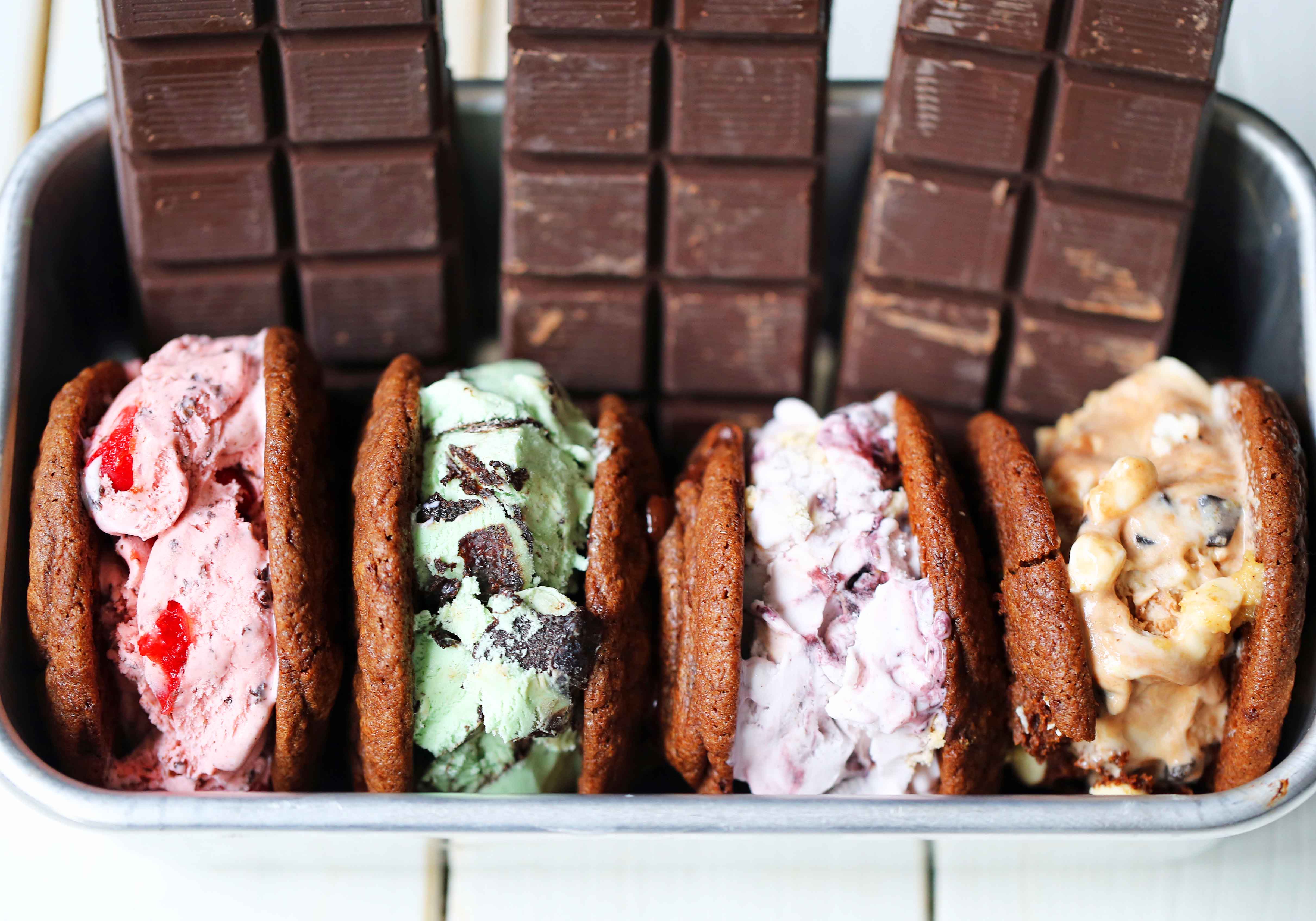 Chocolate Cookie Ice Cream Sandwiches. Soft double chocolate cookies stuffed with your favorite ice cream. How to make the perfect chocolate ice cream sandwich. www.modernhoney.com #icecreamcookiesandwich #icecreamsandwich