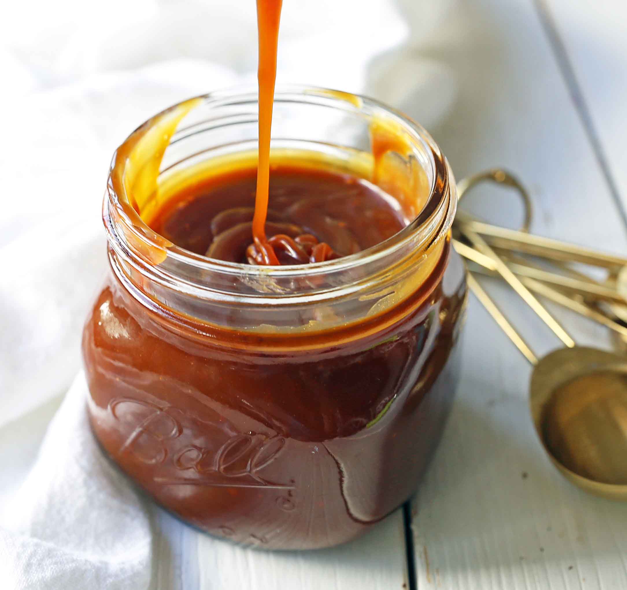 Homemade Salted Caramel Sauce. Sea Salt Caramel Sauce is the perfect ice cream topping. How to make the best caramel sauce at home. www.modernhoney.com #caramel