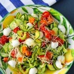 Zucchini Noodles with Tomatoes, Fresh Mozzarella, and Basil. How to make spiralized zucchini noodles (zoodles). Healthy, delicious, and flavorful side dish. The best way to eat your veggies! www.modernhoney.com #zoodles #zucchini #zucchininoodles