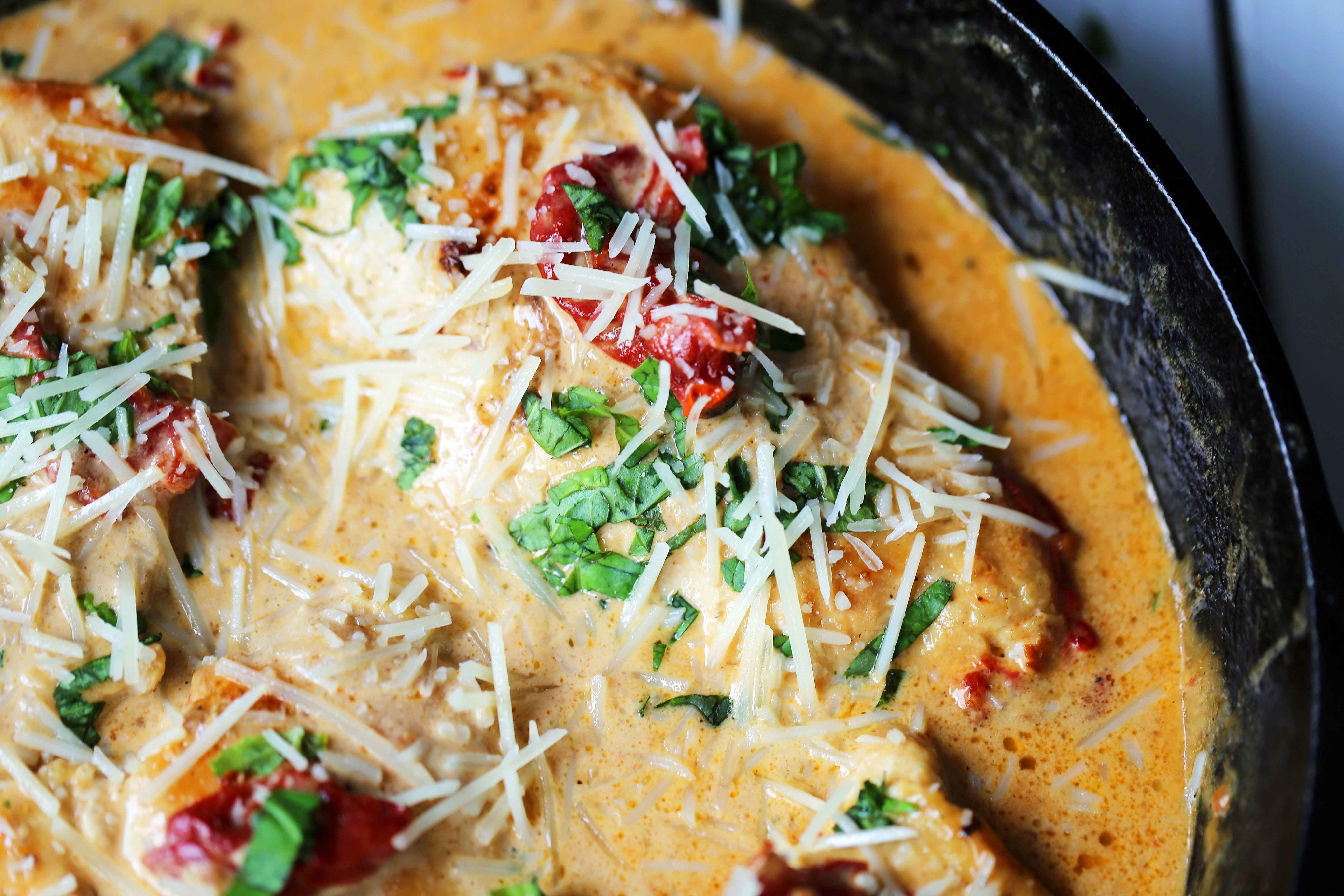 Skillet Chicken with Sun-Dried Tomato Cream Sauce. 20-Minute Chicken made with garlic butter sun-dried tomato parmesan cheese cream sauce. The most flavorful chicken and sauce! You will want to drink the sauce...its THAT GOOD! www.modernhoney.com