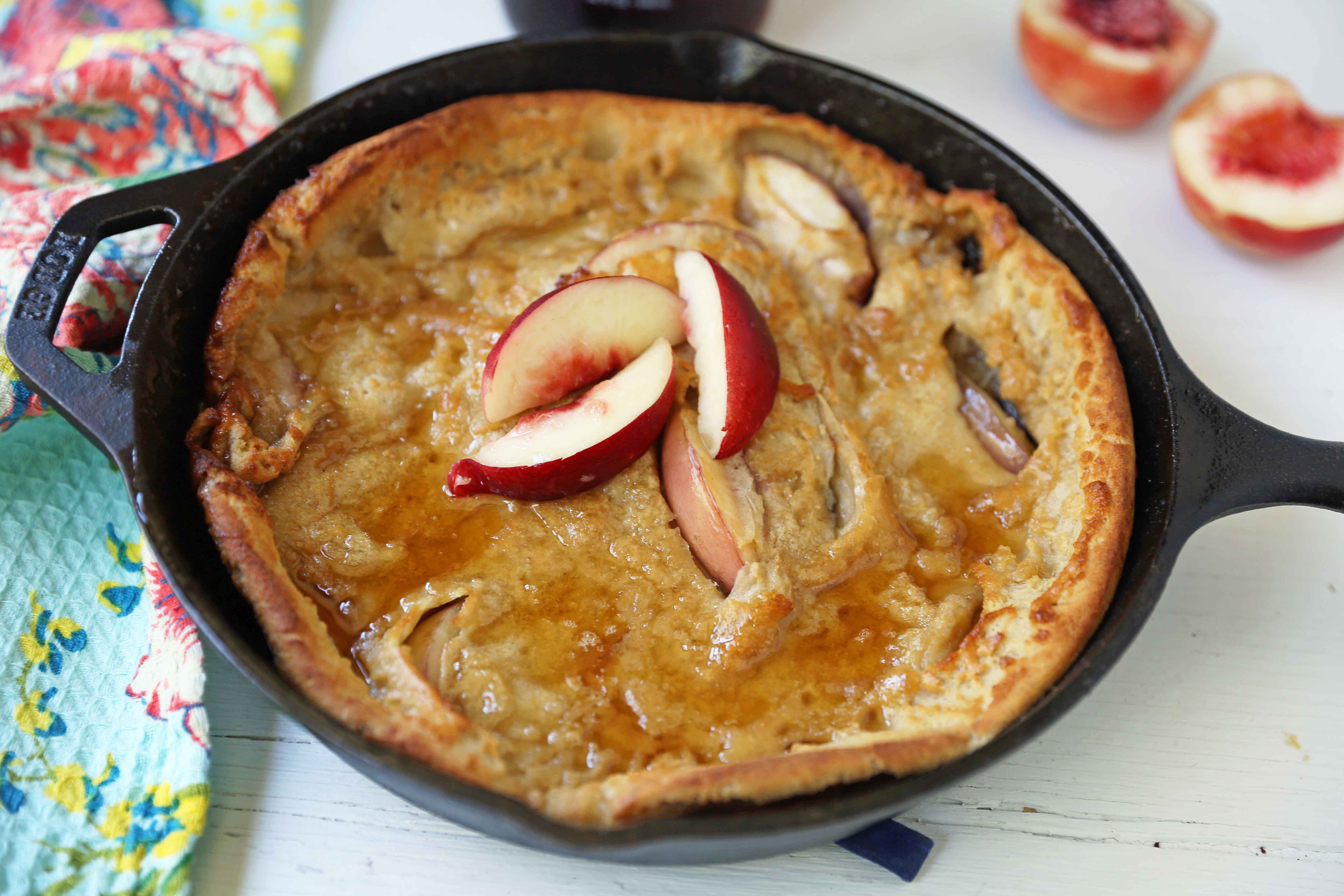 Brown Sugar Peach Dutch Baby Recipe. Sweet Peach and Browned Butter Dutch Baby Pancake. How to make a Peach Dutch Baby. www.modernhoney.com #dutchbaby #puffedpancake #peachpancake #peachdutchbaby