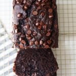 Chocolate Zucchini Bread. A rich double chocolate zucchini bread with chocolate chips recipe. You will never know there is zucchini in this chocolate bread! It is moist, rich, and a chocolate lover's dream! www.modernhoney.com #zucchinibread #chocolatezucchinibread #zucchinirecipes