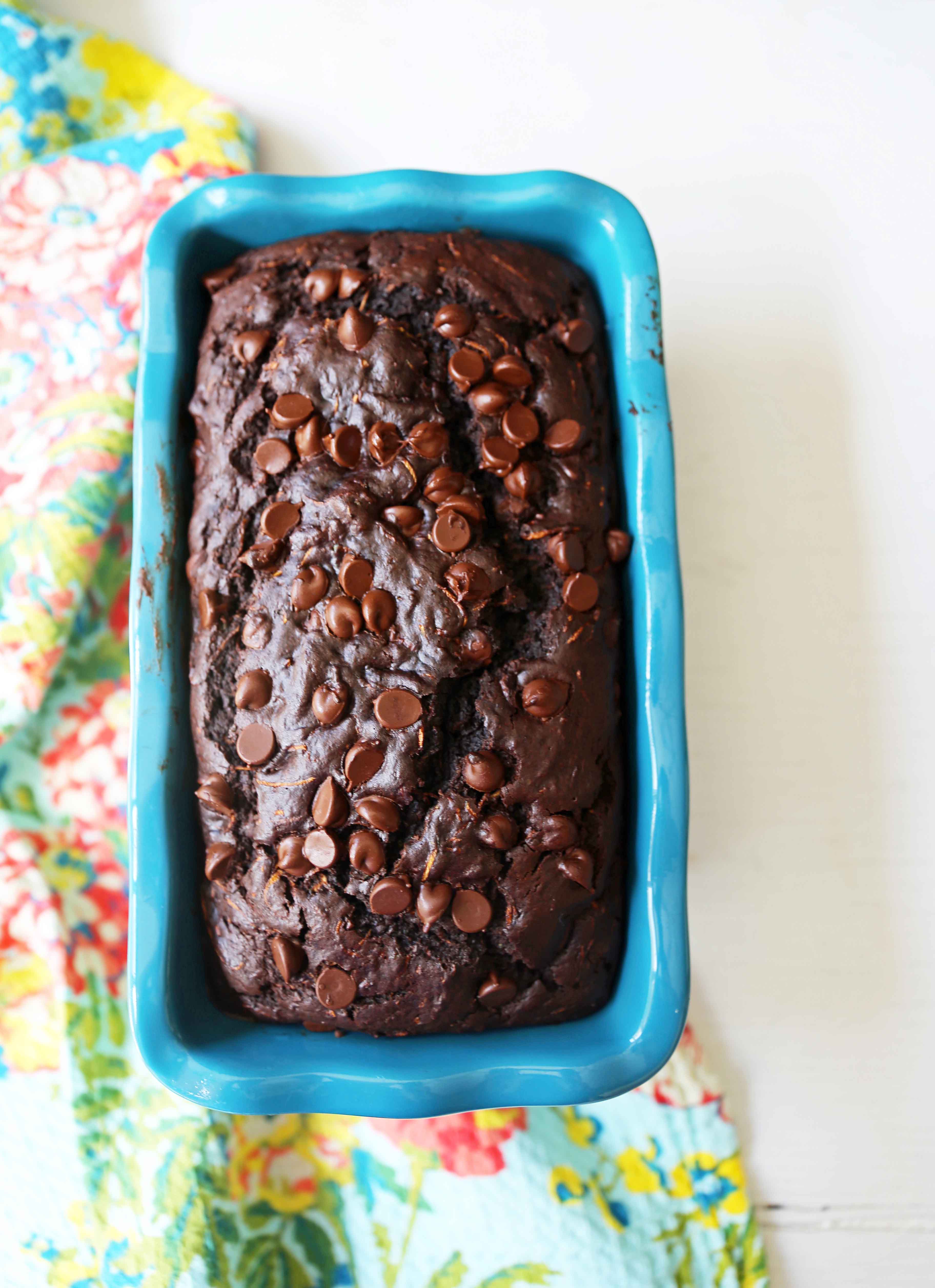 Chocolate Zucchini Bread. A rich double chocolate zucchini bread with chocolate chips recipe. You will never know there is zucchini in this chocolate bread! It is moist, rich, and a chocolate lover's dream! www.modernhoney.com #zucchinibread #chocolatezucchinibread #zucchinirecipes