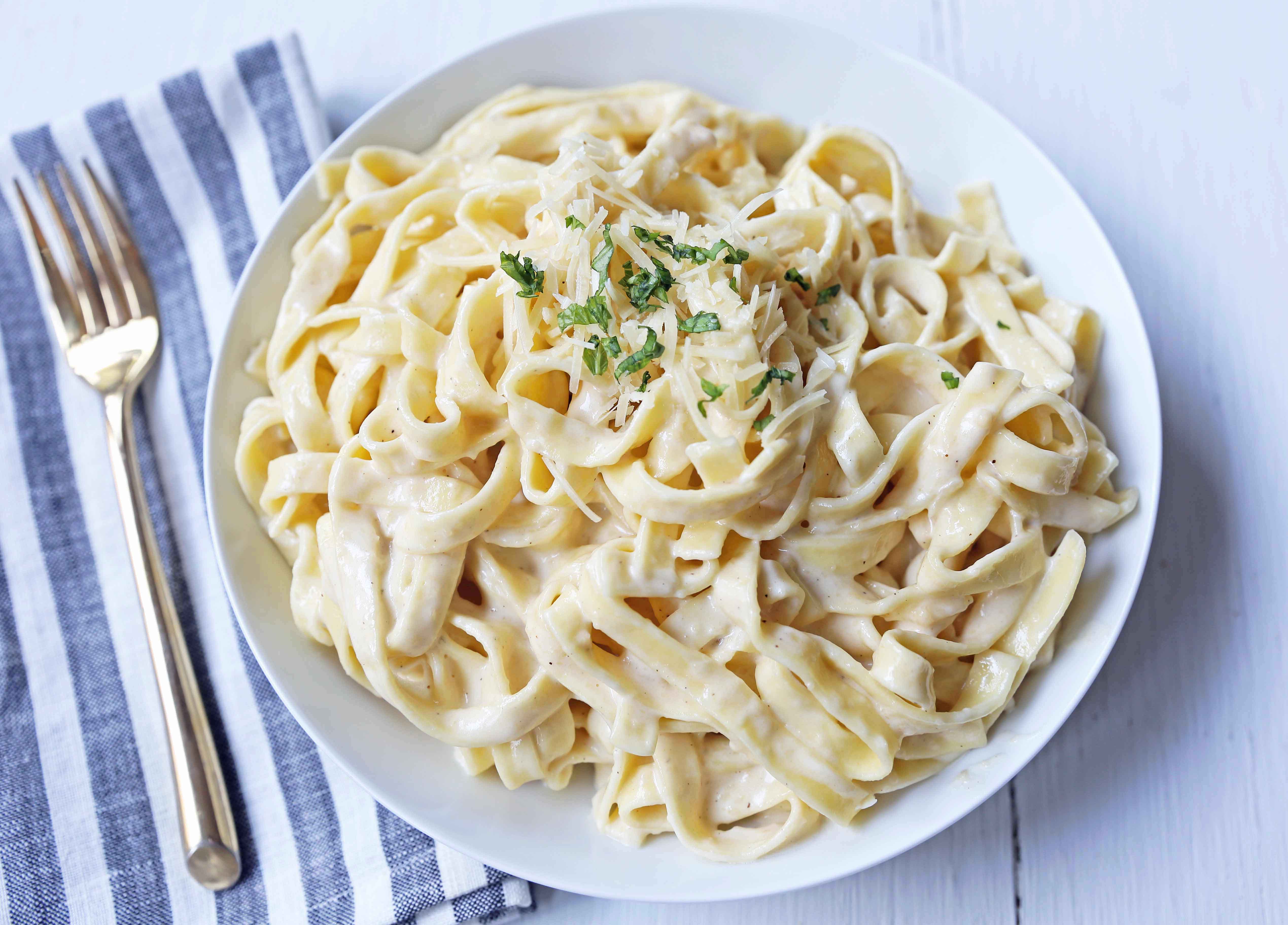 Fettuccine Alfredo Recipe. Homemade alfredo sauce made from scratch using heavy cream, butter, parmesan cheese, and a touch of garlic. The BEST Fettuccine Alfredo Recipe! www.modernhoney.com #fettccinealfredo #pasta