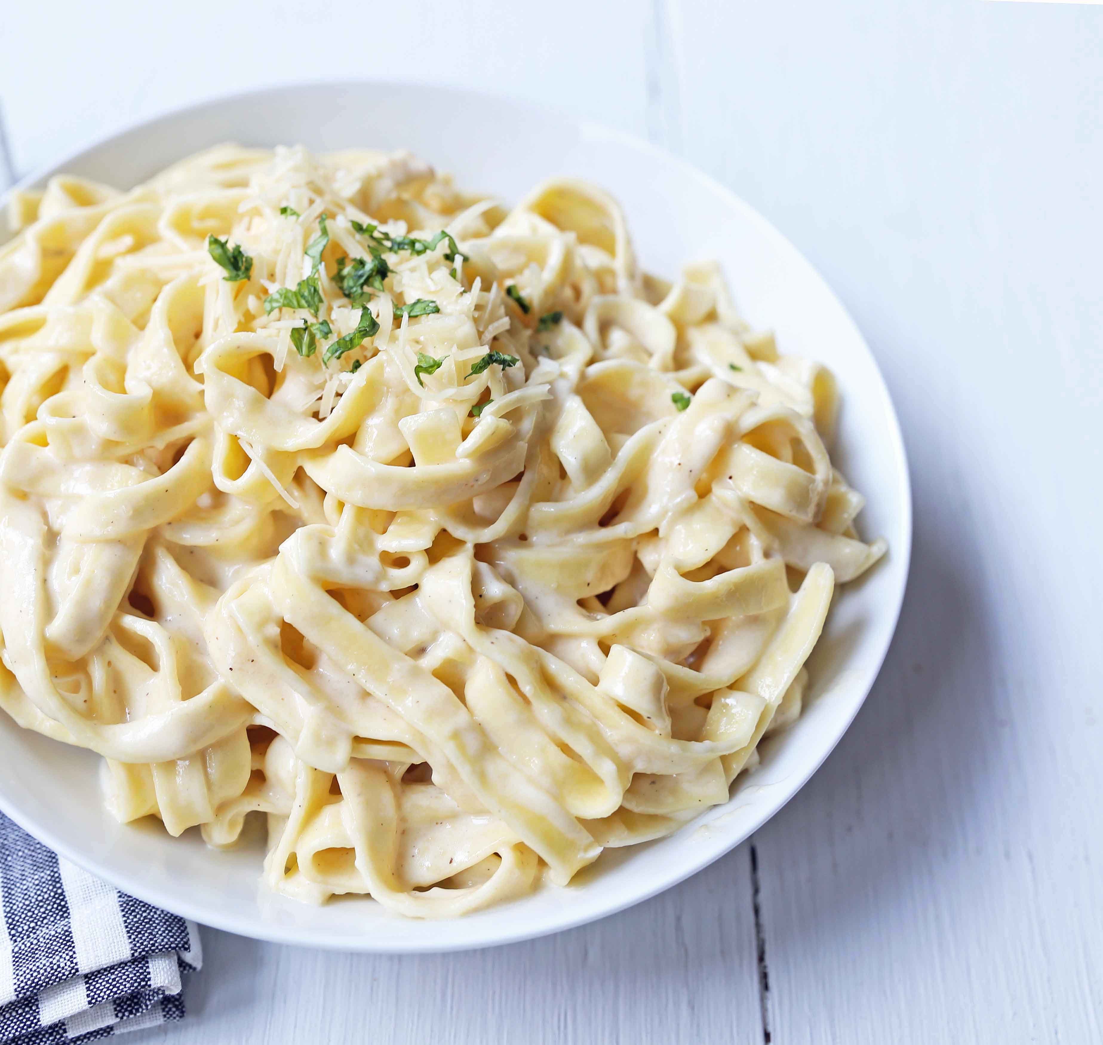 Fettuccine Alfredo Recipe. Homemade alfredo sauce made from scratch using heavy cream, butter, parmesan cheese, and a touch of garlic. The BEST Fettuccine Alfredo Recipe! www.modernhoney.com #fettccinealfredo #pasta