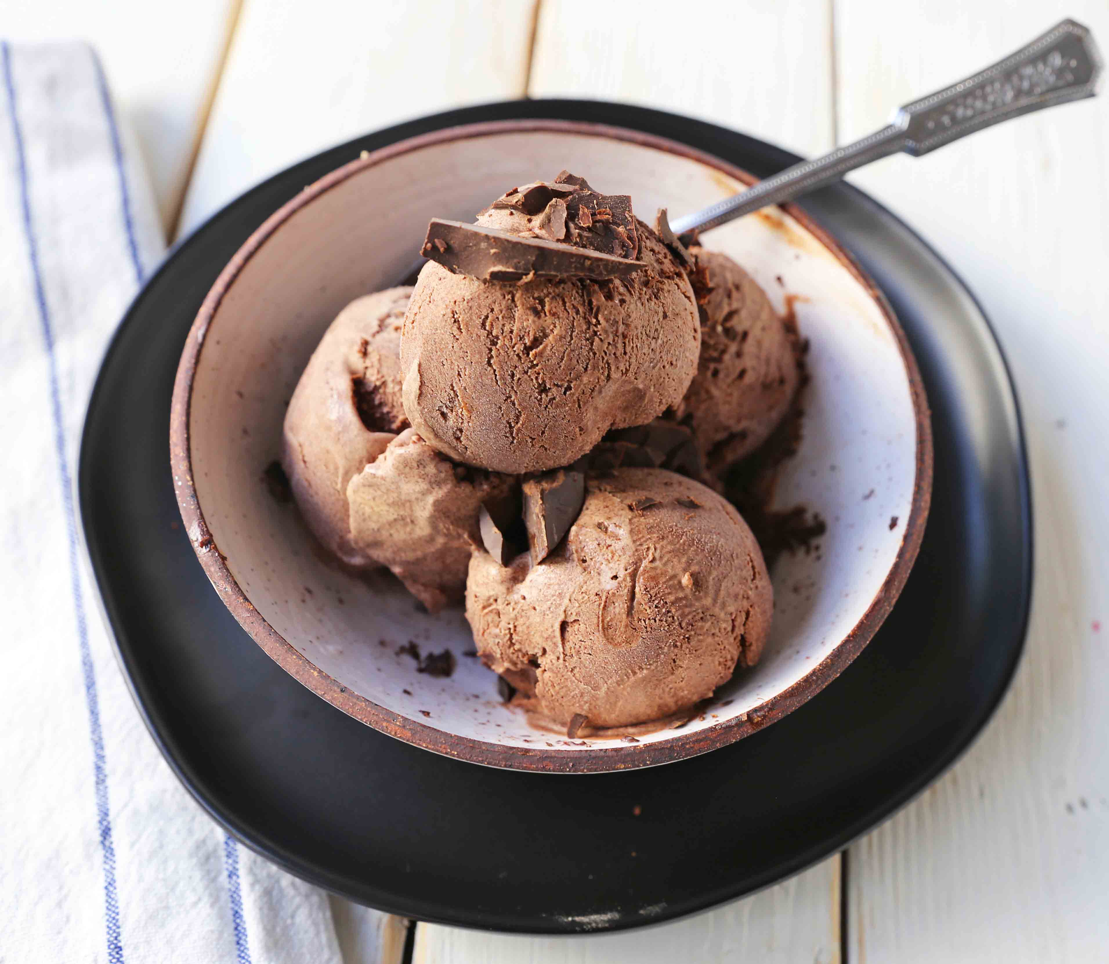 Homemade Chocolate Ice Cream. Handcrafted melted chocolate ice cream using high-quality chocolate and cream. A silky smooth chocolate ice cream made at home. www.modernhoney.com #icecream #homemadeicecream #chocolateicecream