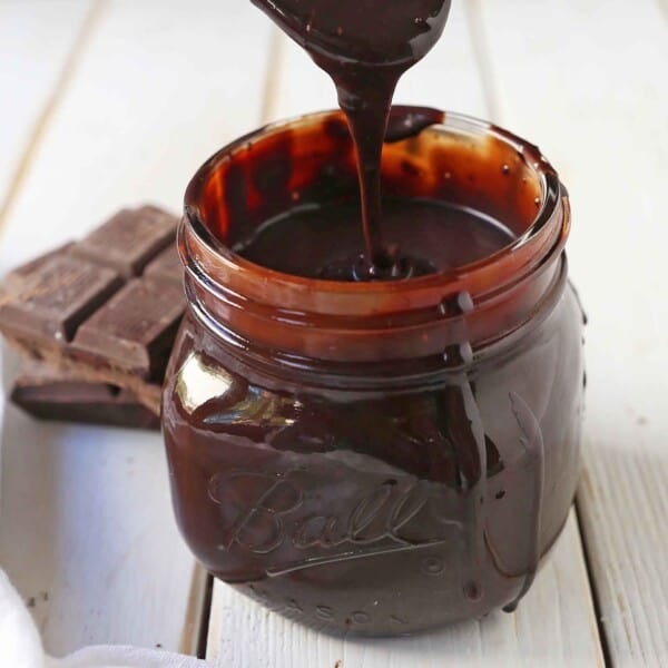 Chocolate Hot Fudge Sauce. Homemade hot fudge recipe perfect to top ice cream. Creamy silky smooth chocolate fudge sauce. www.modernhoney.com #hotfudge