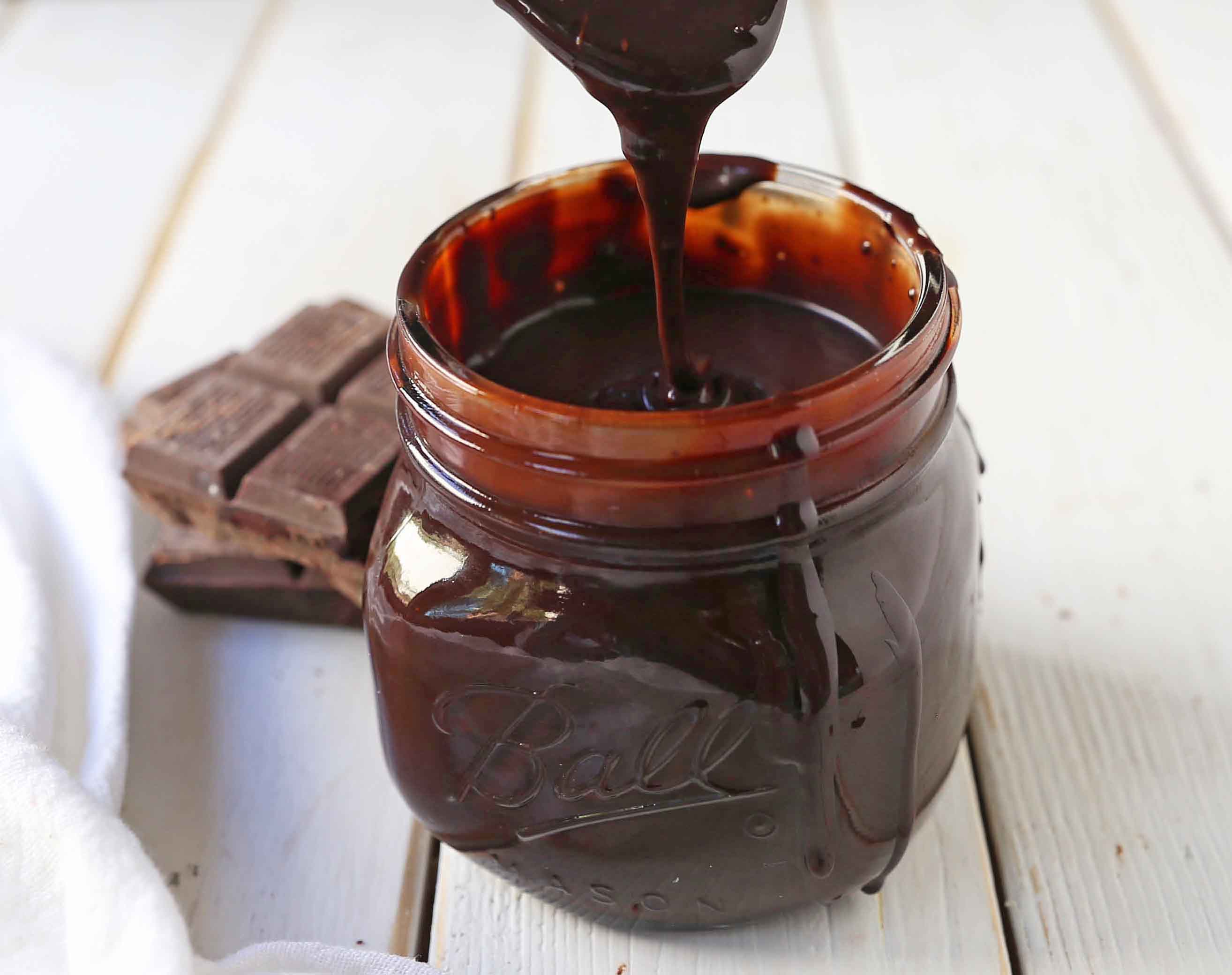 Chocolate Hot Fudge Sauce. Homemade hot fudge recipe perfect to top ice cream. Creamy silky smooth chocolate fudge sauce. www.modernhoney.com #hotfudge