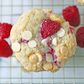 Raspberry White Chocolate Muffins. Soft, moist muffins with fresh raspberries and sweet white chocolate chips. The perfect tart and sweet muffin recipe. Moist raspberry muffins recipe. www.modernhoney.com #raspberrymuffins #muffins #muffinsrecipe