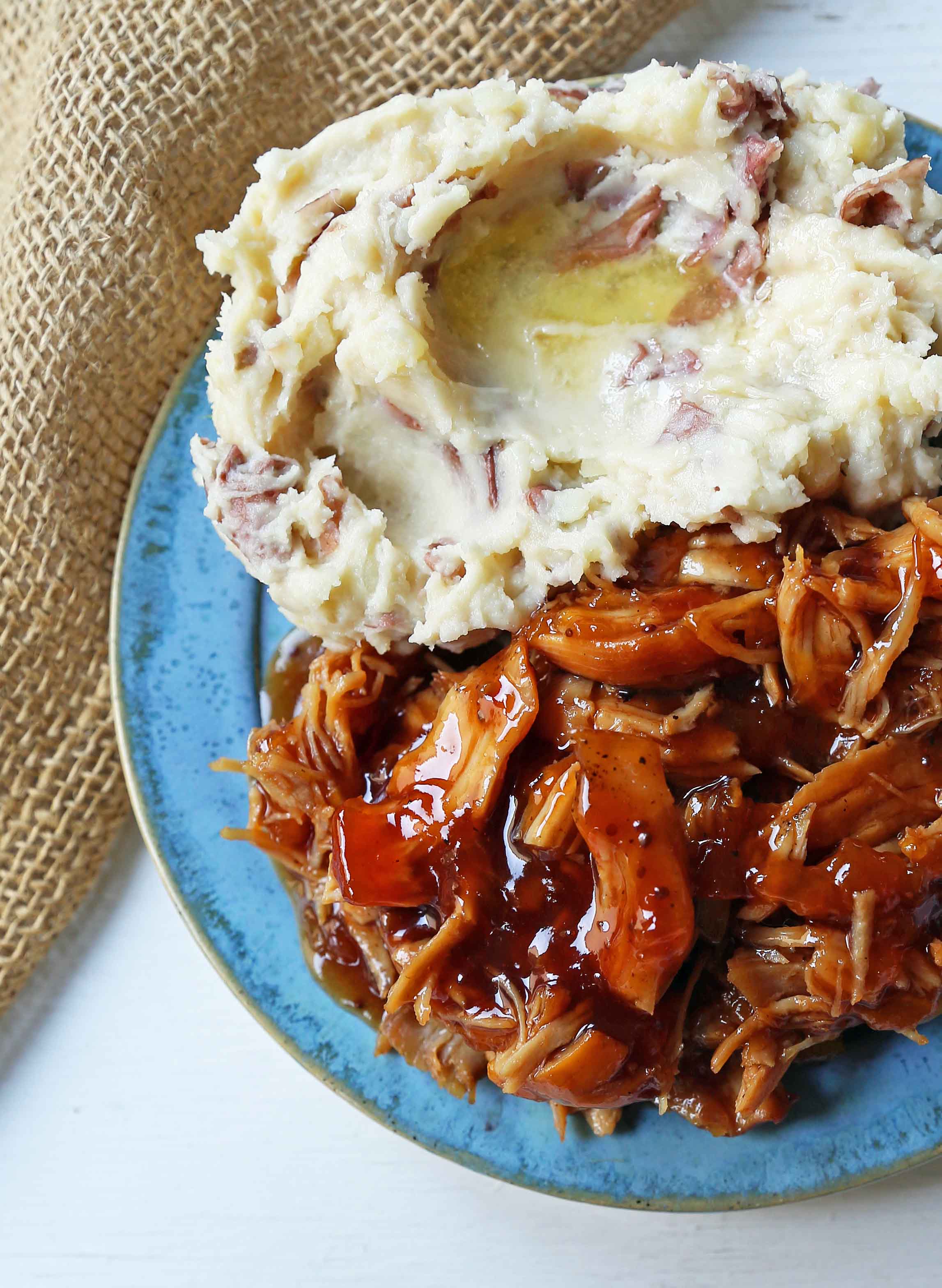 Slow Cooker Peach Barbecue Sauce Chicken. 5-Ingredient Crockpot Chicken with Sweet Peach BBQ Glaze. A fast and flavorful slow cooker chicken with peach bbq sauce. www.modernhoney.com #slowcooker #crockpot