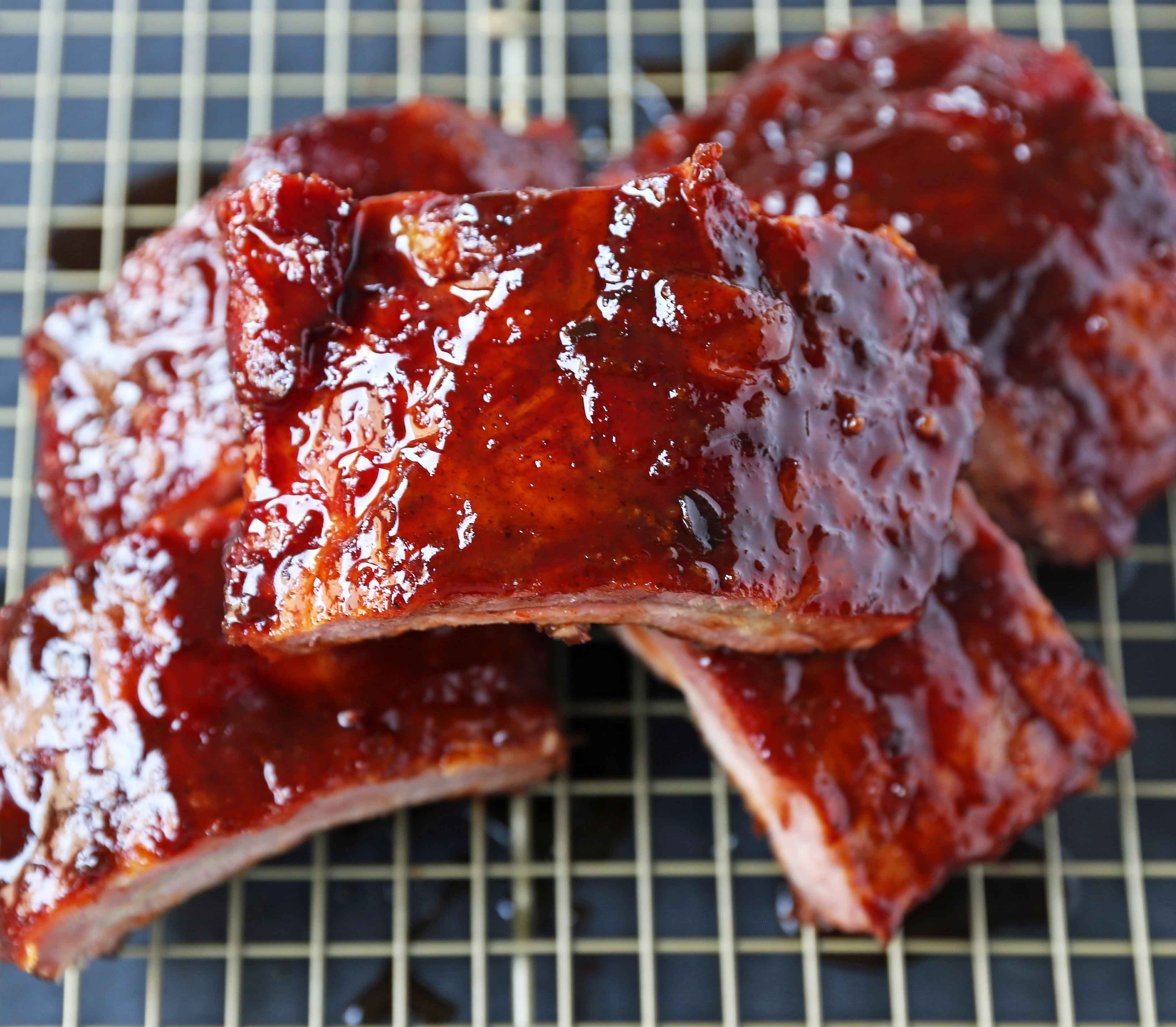 Smoked Baby Back Ribs. Tender, flavorful, fall-off-the-bone Pork Baby Back Ribs. How to smoke ribs or cook in the oven. Perfect BBQ Rub Recipe. #ribs #babybackribs