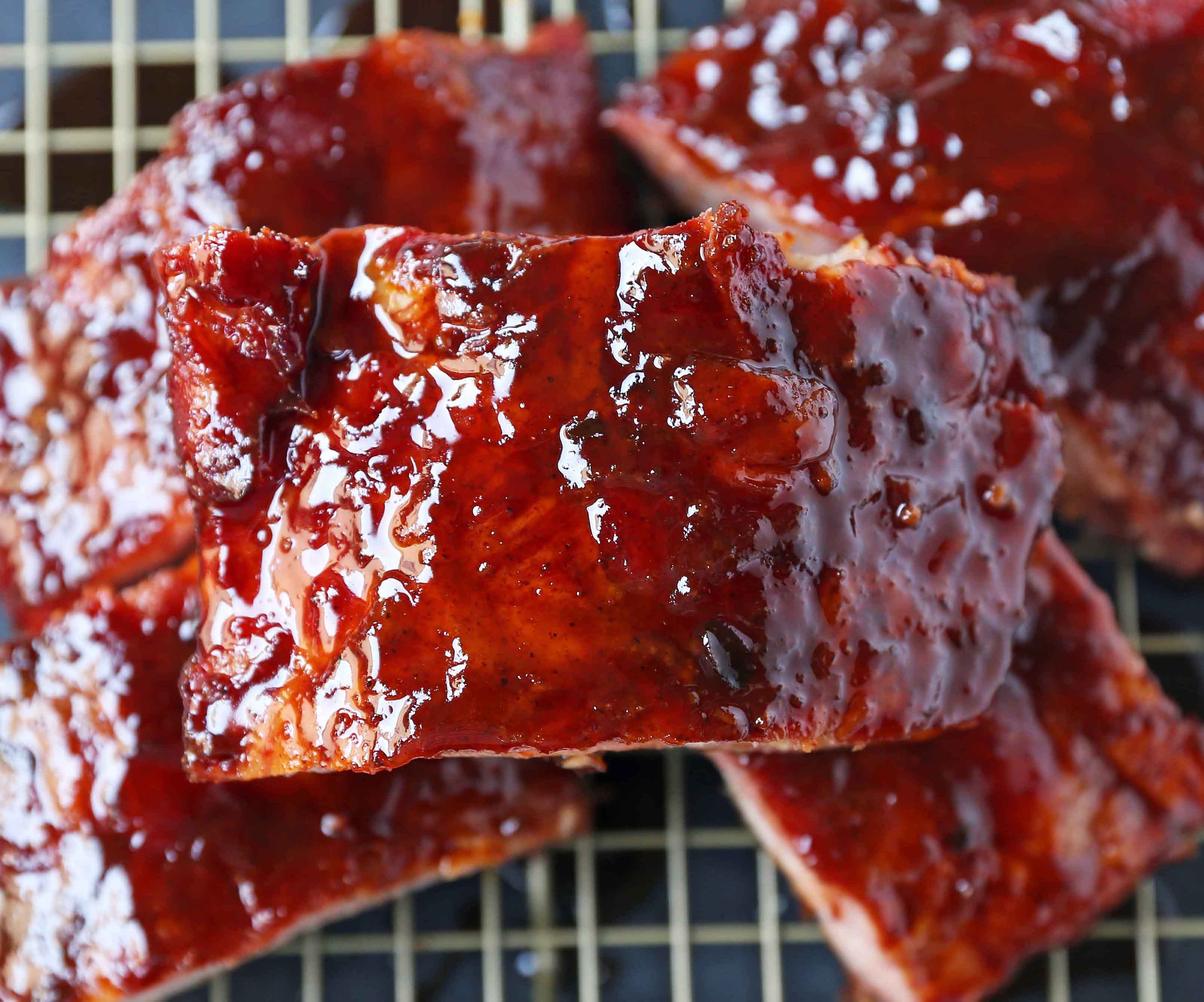 Smoked Baby Back Ribs. Tender, flavorful, fall-off-the-bone Pork Baby Back Ribs. How to smoke ribs or cook in the oven. Perfect BBQ Rub Recipe. #ribs #babybackribs