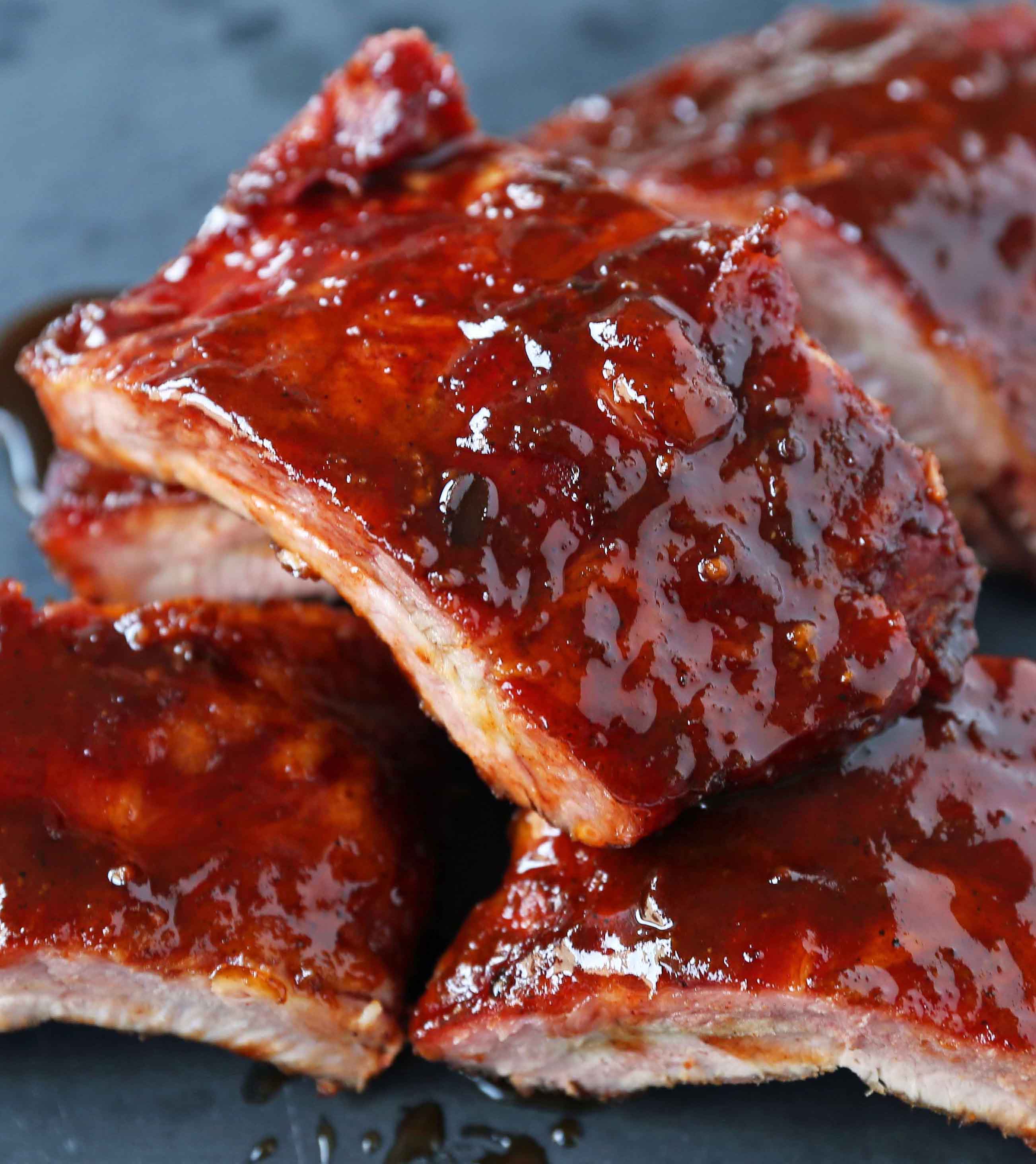 Smoked Baby Back Ribs. Tender, flavorful, fall-off-the-bone Pork Baby Back Ribs. How to smoke ribs or cook in the oven. Perfect BBQ Rub Recipe. #ribs #babybackribs