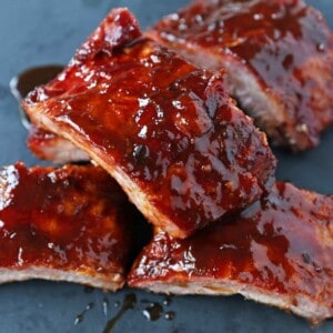 Smoked Baby Back Ribs. Tender, flavorful, fall-off-the-bone Pork Baby Back Ribs. How to smoke ribs or cook in the oven. Perfect BBQ Rub Recipe. #ribs #babybackribs
