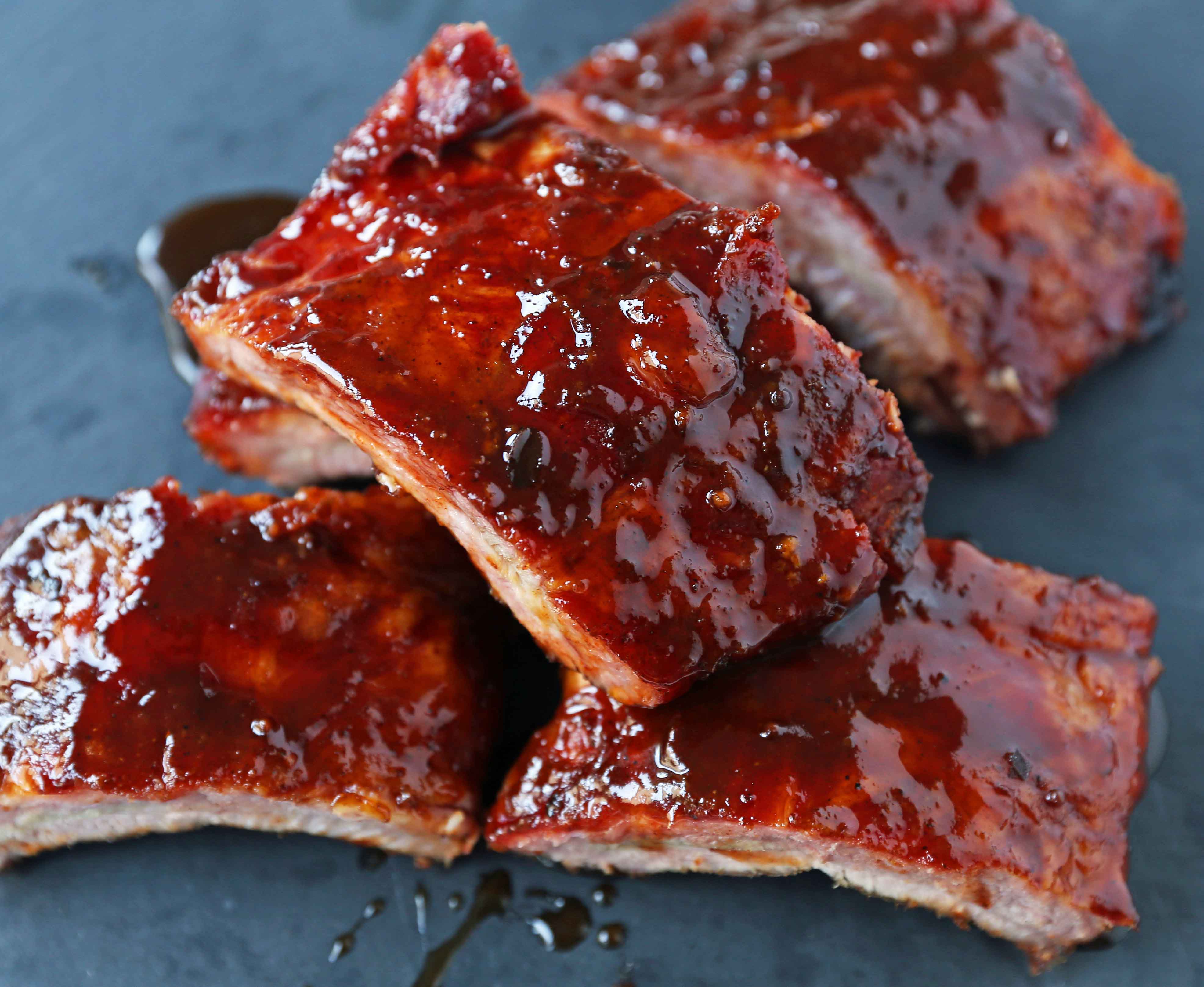 Smoked Baby Back Ribs. Tender, flavorful, fall-off-the-bone Pork Baby Back Ribs. How to smoke ribs or cook in the oven. Perfect BBQ Rub Recipe. #ribs #babybackribs