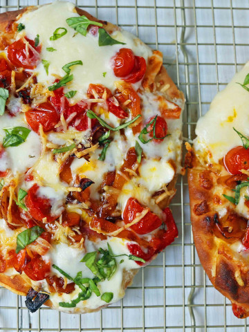 Veggie Pizza Recipe. Homemade veggie pizza with roasted vegetables, mozzarella cheese, and ricotta. Naan Bread Pizza made in 20 minutes! www.modernhoney.com #flatbreadpizza #naanbreadpizza