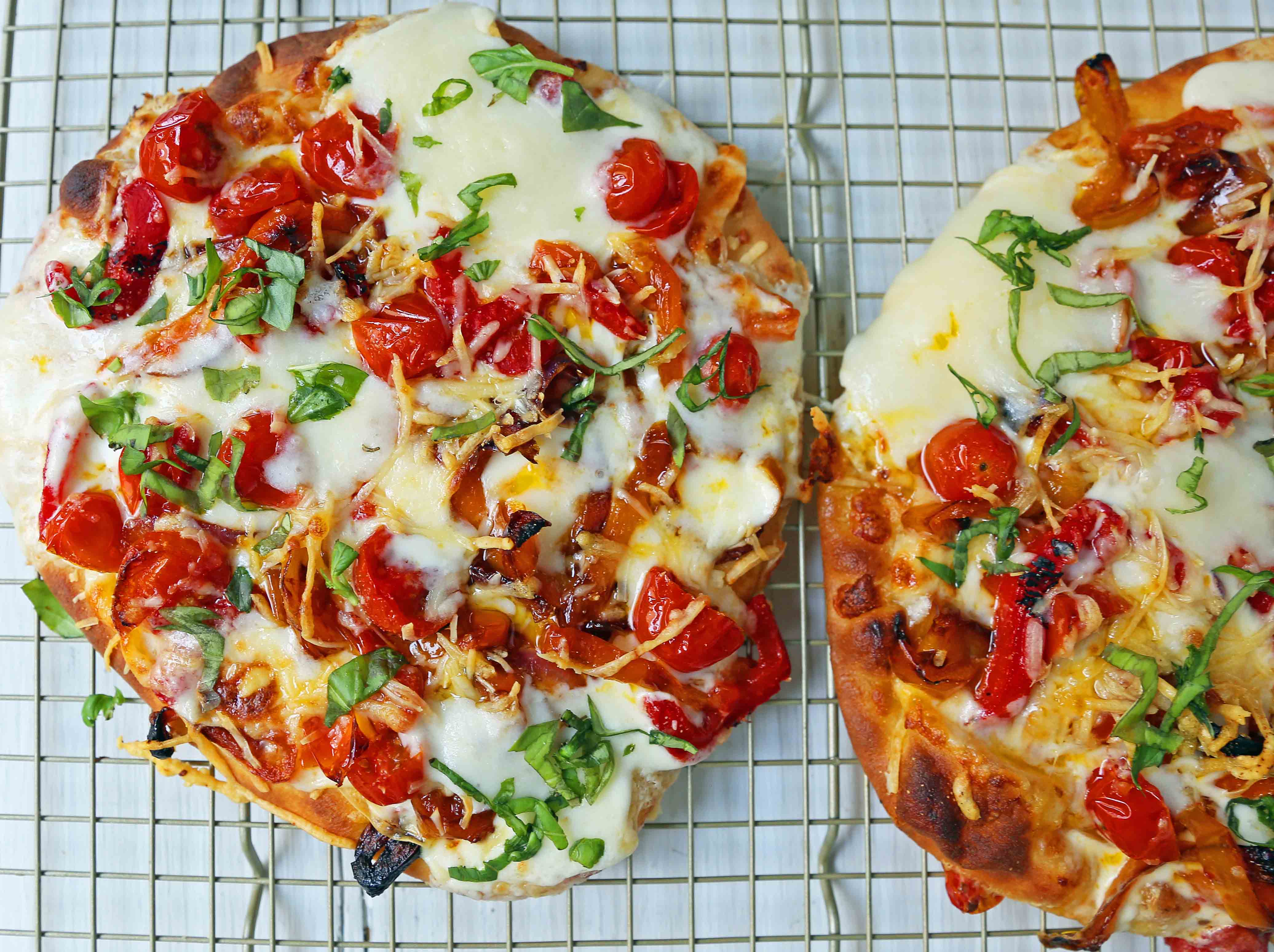 Veggie Pizza Recipe. Homemade veggie pizza with roasted vegetables, mozzarella cheese, and ricotta. Naan Bread Pizza made in 20 minutes! www.modernhoney.com #flatbreadpizza #naanbreadpizza