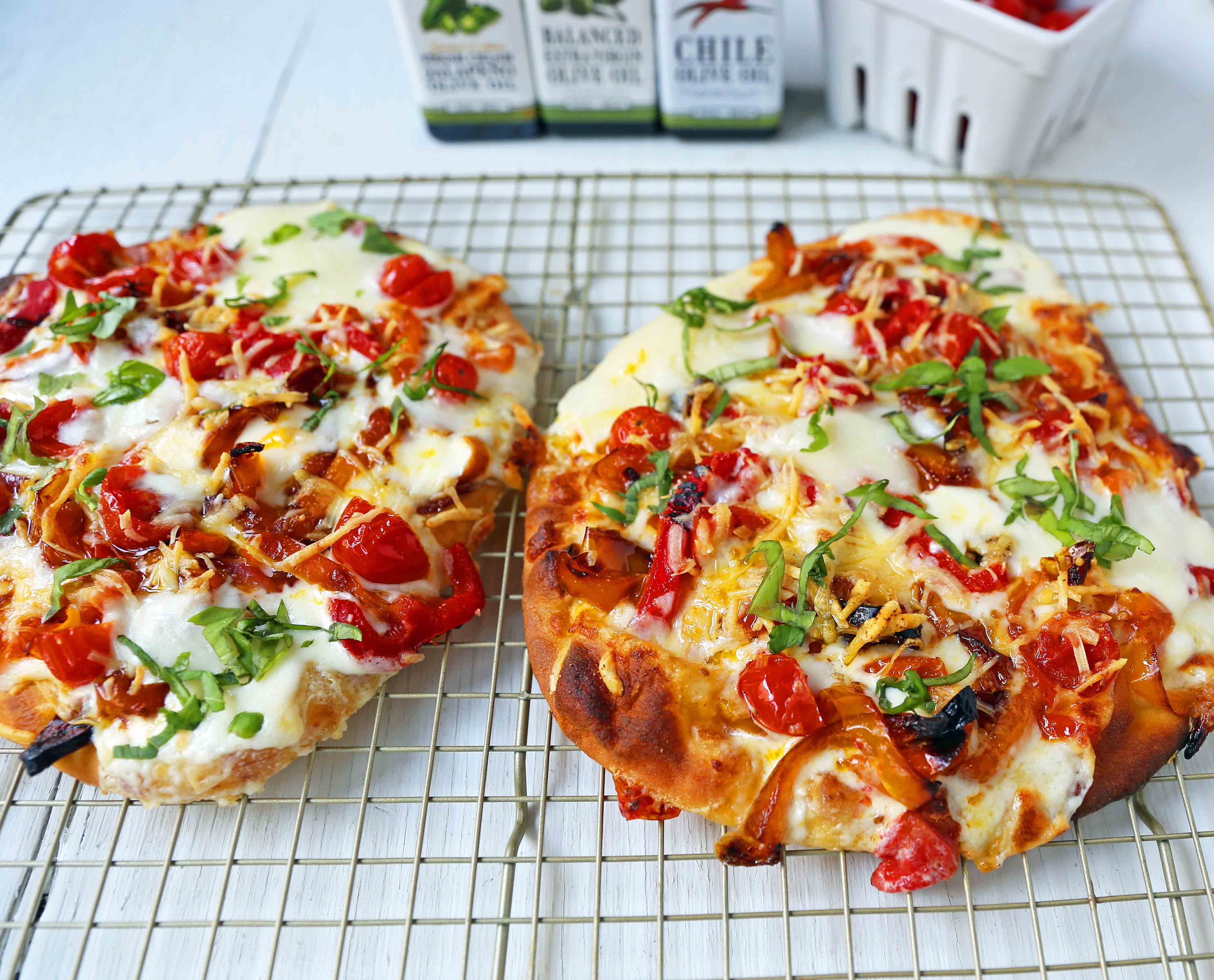 Veggie Pizza Recipe. Homemade veggie pizza with roasted vegetables, mozzarella cheese, and ricotta. Naan Bread Pizza made in 20 minutes! www.modernhoney.com #flatbreadpizza #naanbreadpizza