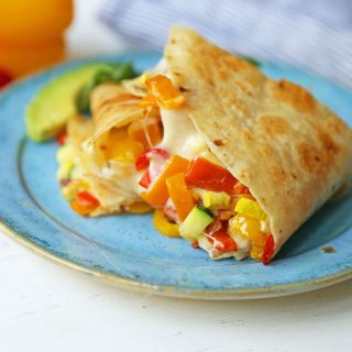 Veggie Quesadilla Recipe. Summer veggies with ooey gooey melted cheese in a buttery golden tortilla. The best veggie quesadilla recipe. www.modernhoney.com #veggiequesadilla #vegetarian #vegetarianrecipe