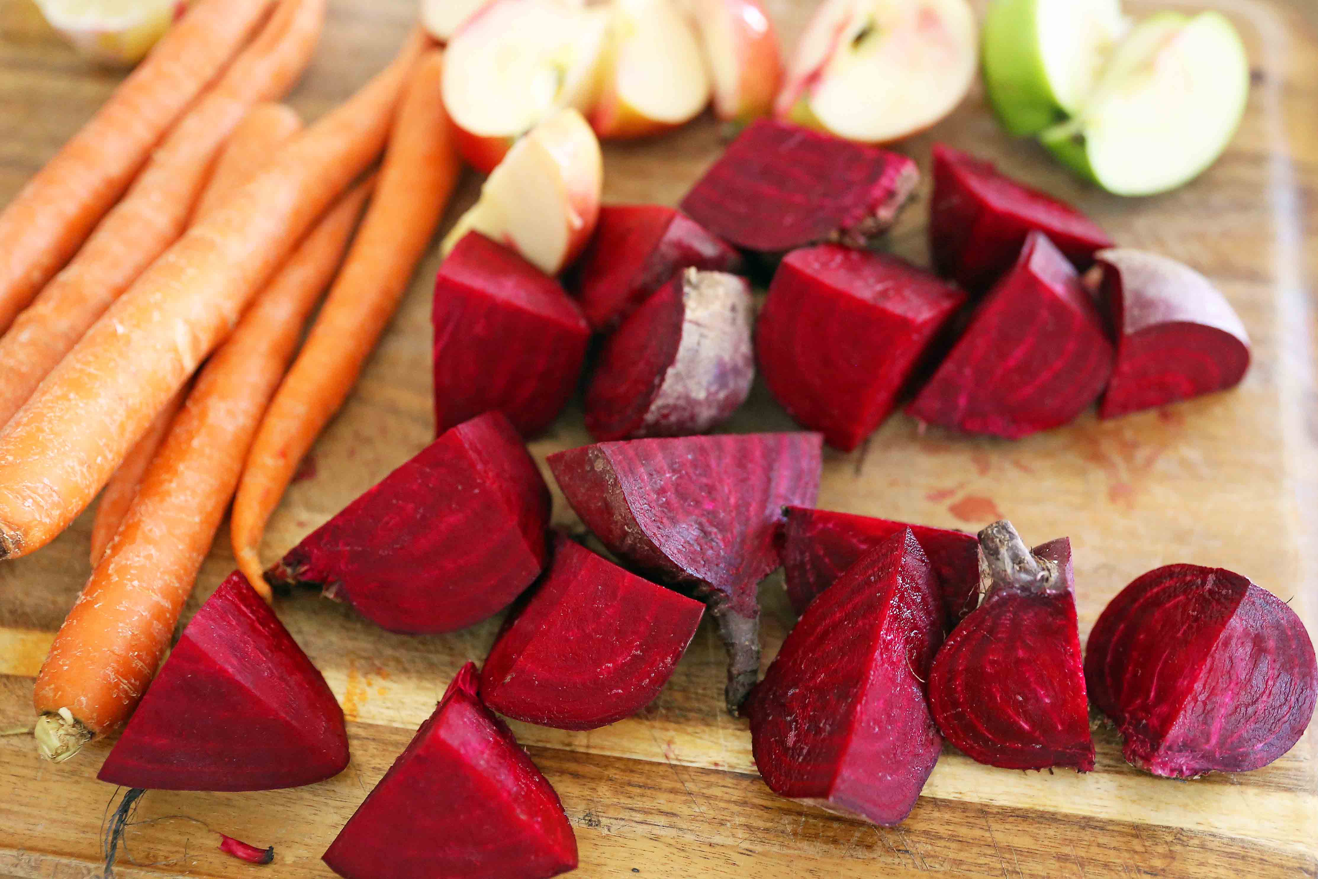 Beets, Carrots, Apples for Juicing. Healthy Juice Cleanse Recipes. Four health fresh fruit and vegetable juice recipes. How to make fresh juices at home for a fraction of the price. Find out the immune boosting and health benefits from juicing. www.modernhoney.com #juicing #juices #fruitandvegetablejuices #juicingrecipes