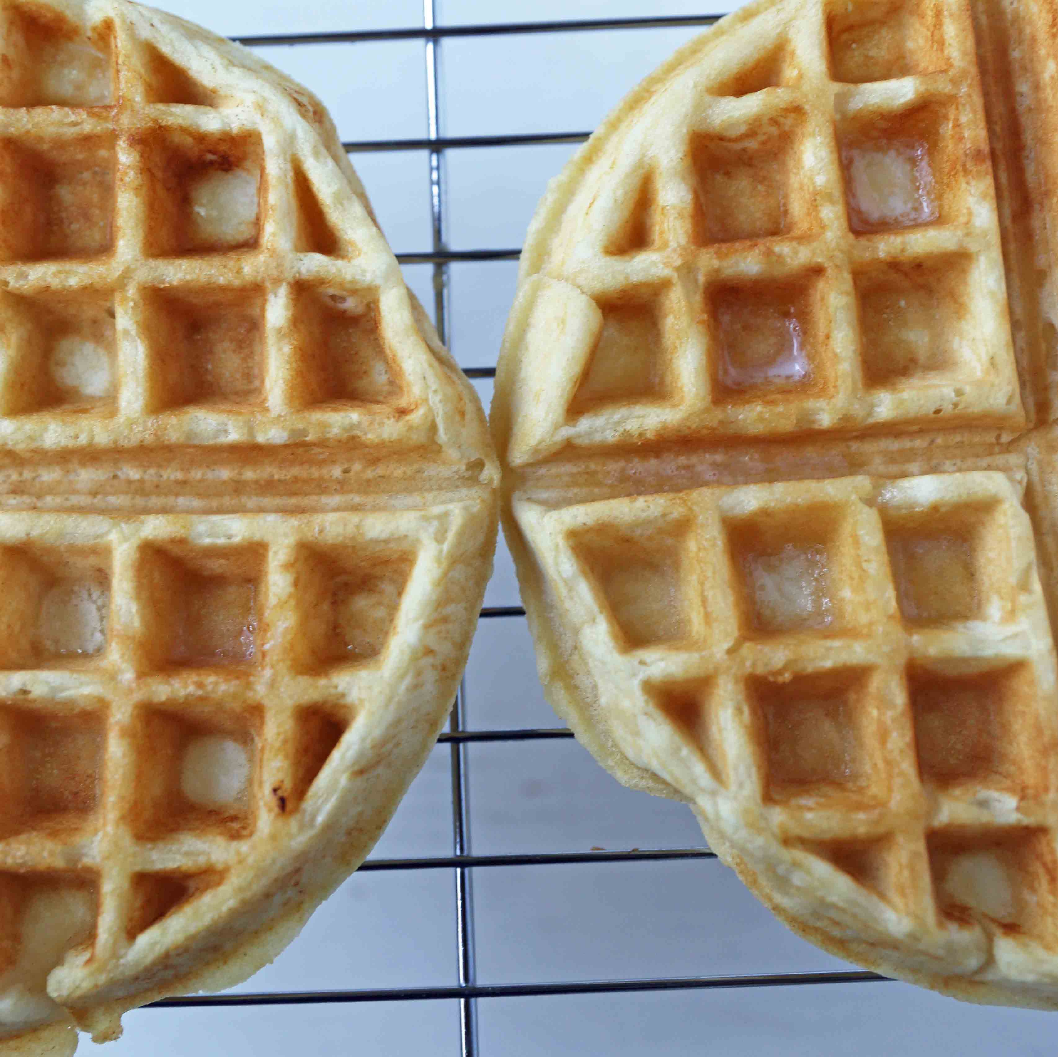 One Bowl Easy Buttermilk Waffles. Quick waffle recipe which creates chewy, crispy, and buttery waffles. The perfect waffle recipe. www.modernhoney.com #waffles #wafflerecipe #buttermilkwaffles #buttermilkwaffle 