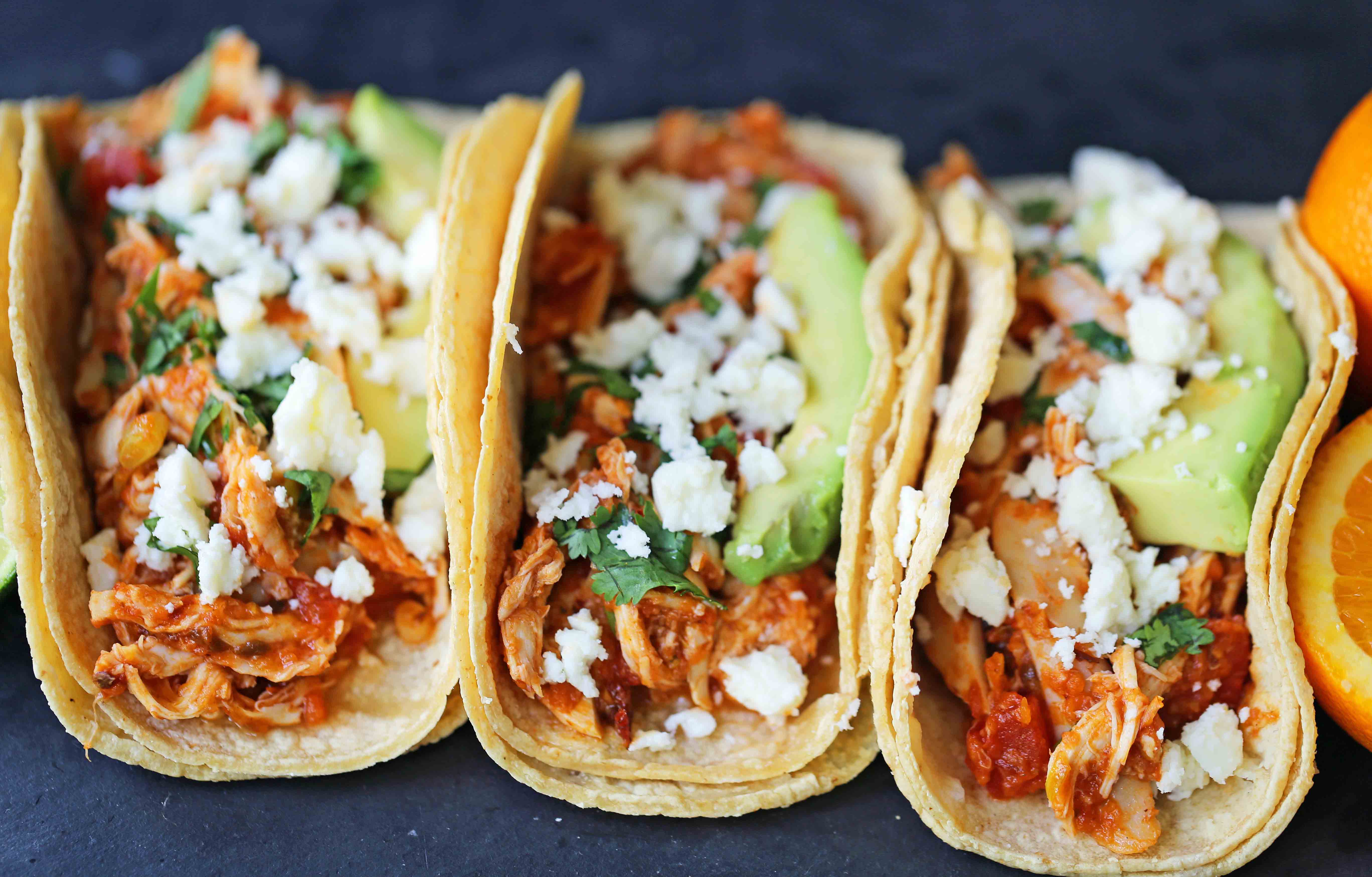 Chipotle Chicken Tinga Tacos. A simple, quick, and easy chicken taco recipe. One skillet chicken taco recipe. www.modernhoney.com #chickentinga #chipotlechicken #chickentacos #chickentingatacos 