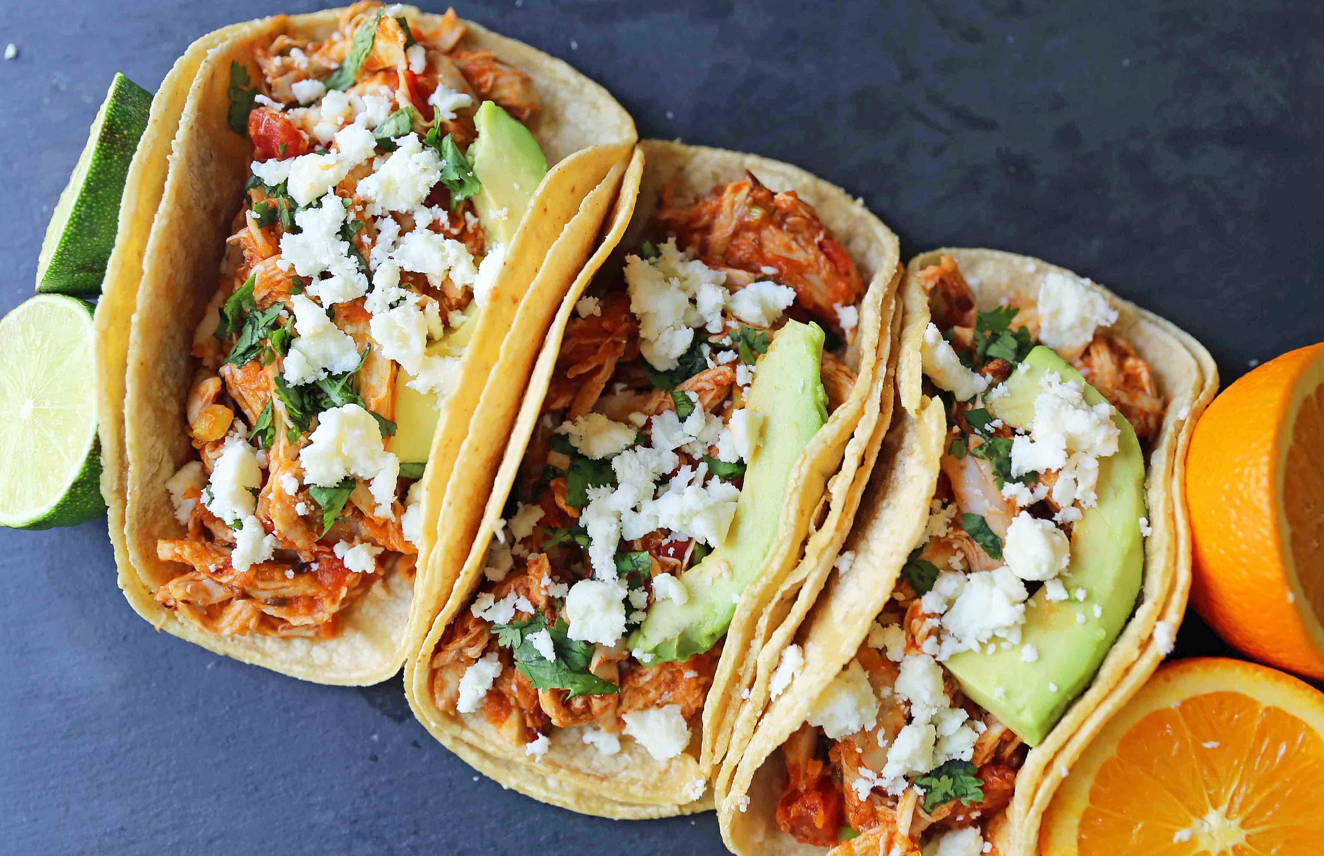 Chipotle Chicken Tinga Tacos. A simple, quick, and easy chicken taco recipe. One skillet chicken taco recipe. www.modernhoney.com #chickentinga #chipotlechicken #chickentacos #chickentingatacos 