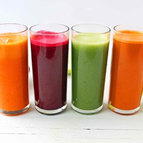 Healthy Juice Cleanse Recipes. Four health fresh fruit and vegetable juice recipes. How to make fresh juices at home for a fraction of the price. Find out the immune boosting and health benefits from juicing. www.modernhoney.com #juicing #juices #fruitandvegetablejuices #juicingrecipes