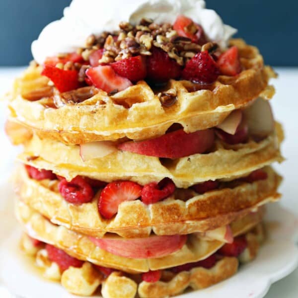 One Bowl Easy Buttermilk Waffles. Quick waffle recipe which creates chewy, crispy, and buttery waffles. The perfect waffle recipe. www.modernhoney.com #waffles #wafflerecipe #buttermilkwaffles #buttermilkwaffle