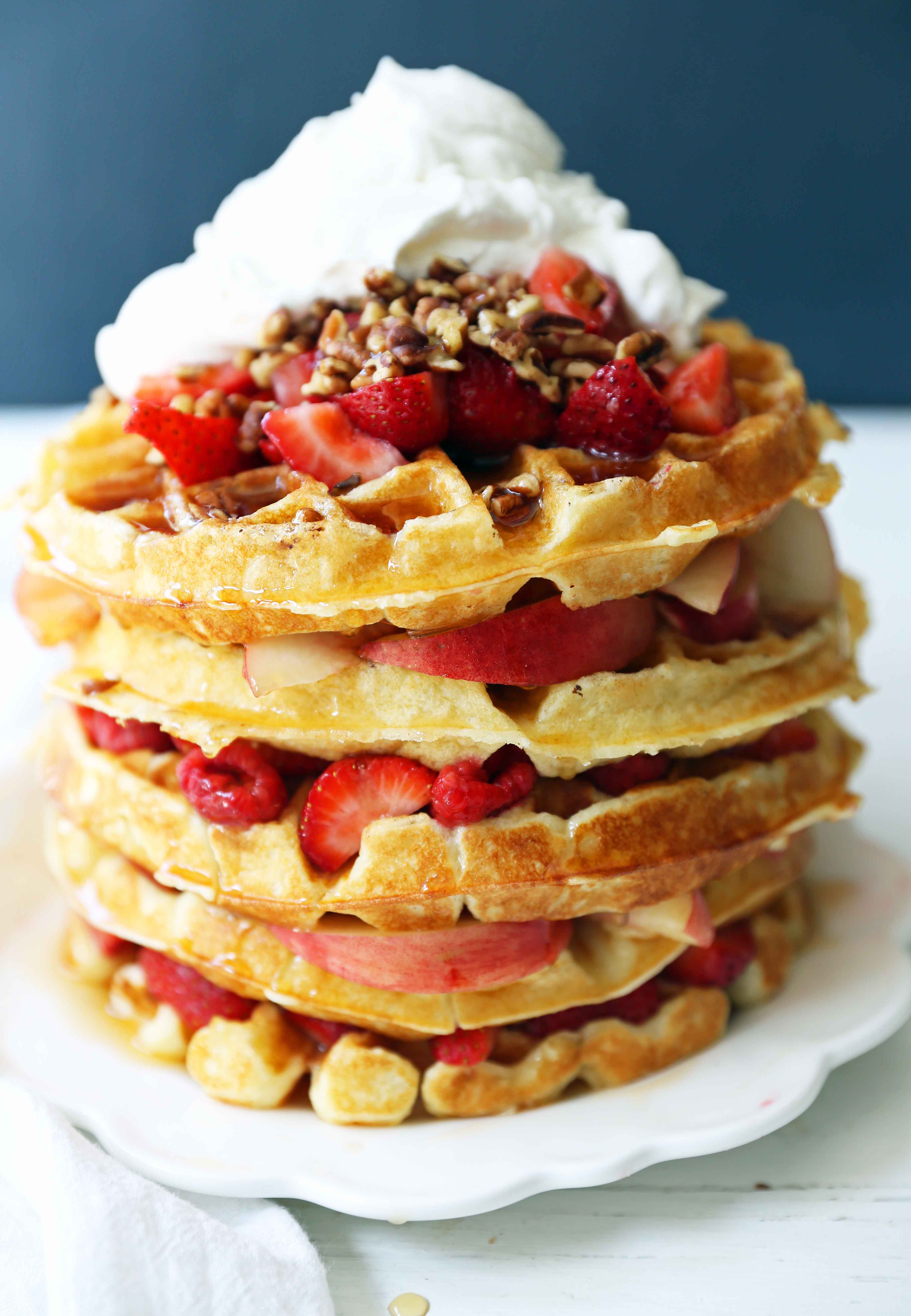 One Bowl Easy Buttermilk Waffles. Quick waffle recipe which creates chewy, crispy, and buttery waffles. The perfect waffle recipe. www.modernhoney.com #waffles #wafflerecipe #buttermilkwaffles #buttermilkwaffle 