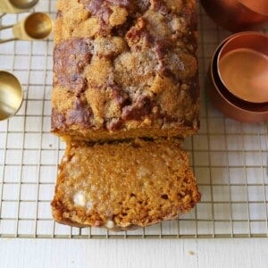 How to make an easy, moist pumpkin bread with a brown sugar streusel topping. This moist and flavorful homemade pumpkin bread is a fall favorite in our home and is full of warm spices and pumpkin flavor. This is the best pumpkin bread recipe!