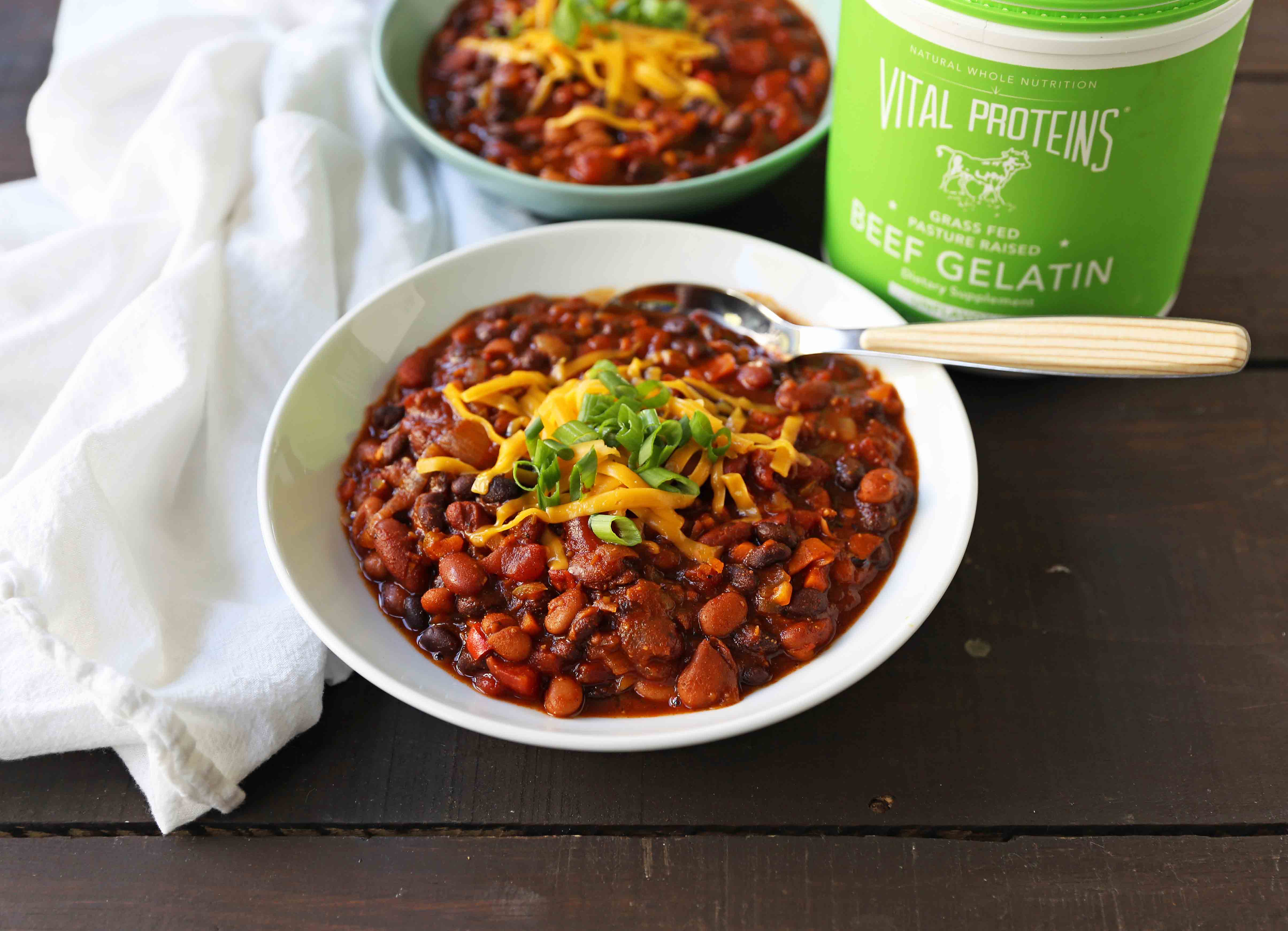 Veggie Chili Recipe. A healthy vegetable and bean filled chili in a spicy tomato sauce. The perfect Veggie Chili recipe and you won't even miss the meat! www.modernhoney.com #veggiechili #veggiechilirecipe #vegetarian #chili