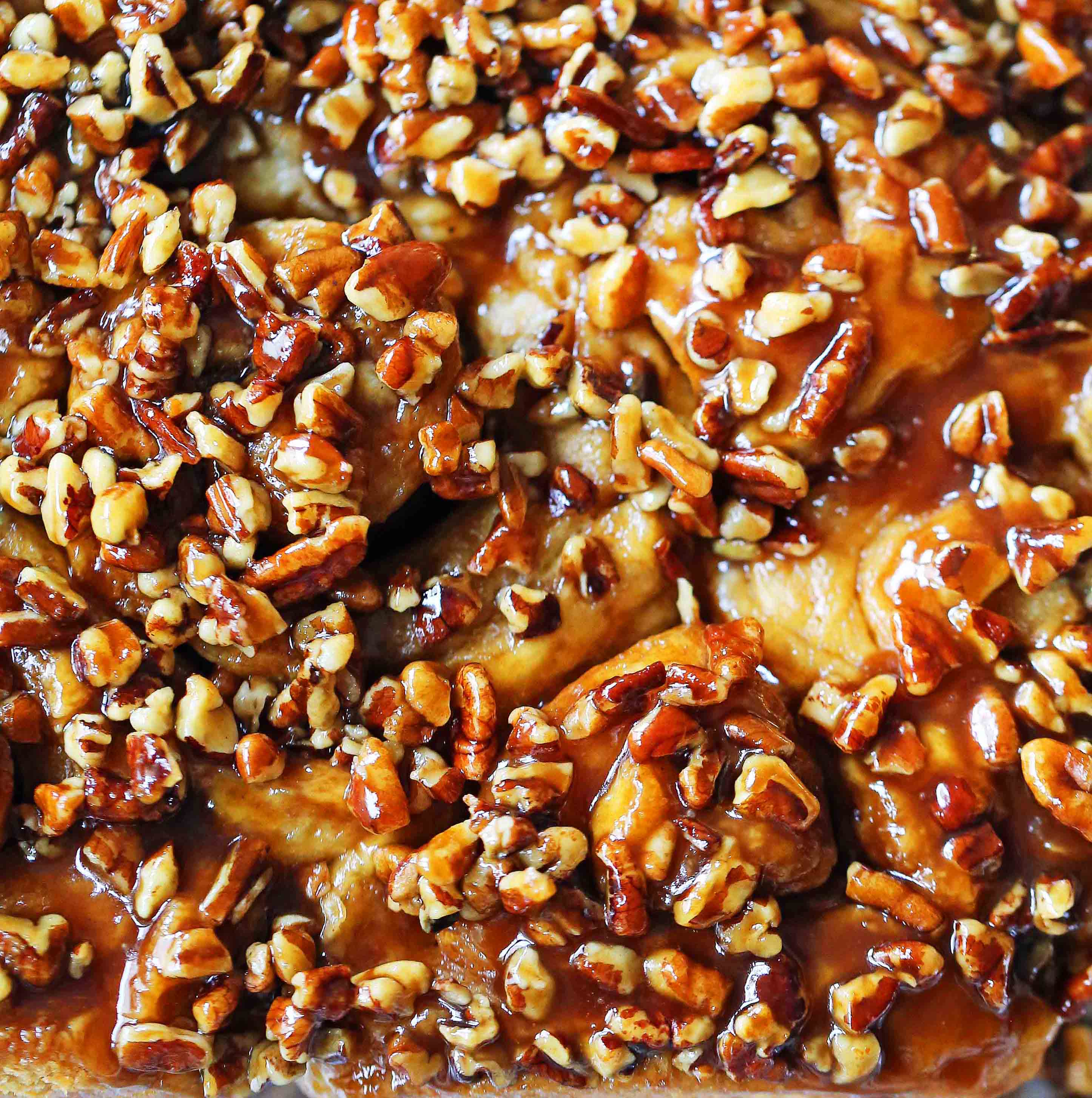 Caramel Pecan Rolls Homemade sweet rolls with rich caramel sauce and pecans. The perfect pecan sticky buns recipe! How to make homemade sticky buns from scratch. www.modernhoney.com #stickybuns #pecanrolls #caramelpecanrolls #caramelrolls #caramelstickybuns #pecanbuns